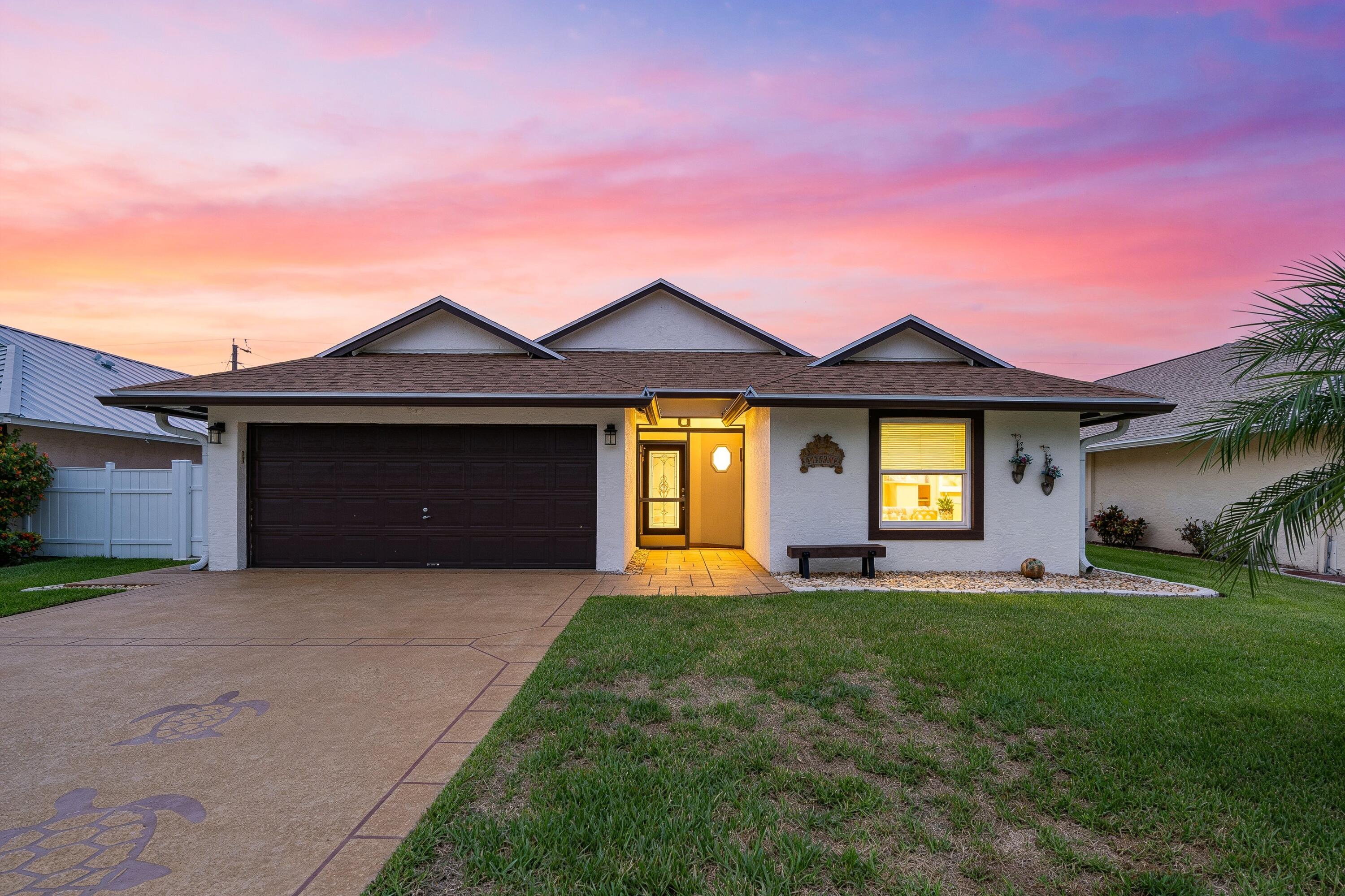 ABSOLUTELY GORGEOUS SINGLE STORY HOME |  PRESTIGIOUS PENNOCK LANDING | FULLY RENOVATED | EXQUISITE HIGH-END QUALITY WORKMANSHIP | NEW 2023 ROOF | Bright Open Split Floor Plan | Abundance of Natural Light | Dramatic Vaulted Ceilings | LED Custom & Recessed Lighting | Eat-In Kitchen | Breakfast Bar | White Wood Cabinets | S/S Appliances | Breakfast Nook |  Large Primary Suite | Walk-In Closets | Ensuite, Dual Sink Vanity, Soaking Tub, Glass Shower | Huge Screeded Patio | Incredible Tropical Lush Manicured Landscaping | Vinyl Fence |  Hurricane Impact Windows & Doors | 2 Car Garage with Epoxy Floors | New Gutters | Solar Attic Fan |Top Rated Schools |  Prime Jupiter Location |Minutes to Fine Dining, Shopping, Parks, Beaches & Major Highways | AC 2020 | WH 2021 | Present All Offers!