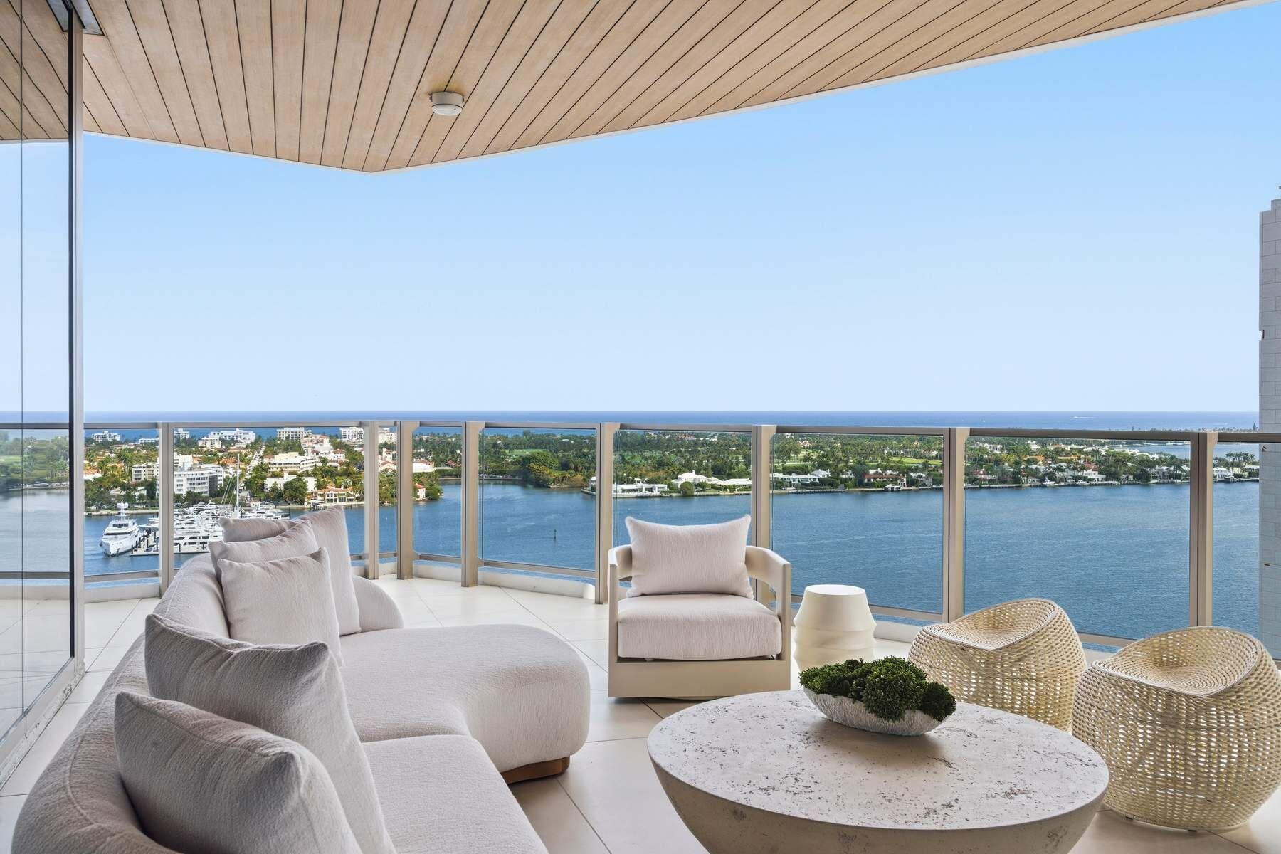 Turnkey and fully furnished, this 4 BR/ 4.5 BA flow through home on the 17th floor of Forte spans 5,458 sq ft and captures sweeping 180 degree views of the Intracoastal, Palm Beach & the ocean through floor-to-ceiling glass. Private elevator foyer opens to an expansive open concept living and dining areas designed for effortless entertaining and refined everyday living. The kitchen is outfitted with Italian cabinetry, Sub-Zero® and Wolf® appliances and Waterworks® fixtures. The luxurious primary suite boasts dual vanities & commodes, soaking tub, steam shower, and spacious walk-in closets. The 3 additional en-suite bedrooms have city views and terraces perfect for watching the stunning sunsets. Upgraded with built-ins, cove lighting, low voltage wiring and ready for smart home integration. There is a full laundry room with sink and an additional utility room. Located in the prestigious Forté on Flagler, with only 41 units, residents enjoy full-service luxury amenities including valet parking, 24-hour concierge, 75' lap pool, golf simulator, fitness center, yoga studio, multiple lounges, spa and steam room, and a 24 seat dining room with catering kitchen, guest suites, house car and curated resident services. Minutes to Worth Avenue, pristine beaches, downtown, and Palm Beach International Airport. Two garage spaces side by side are included.