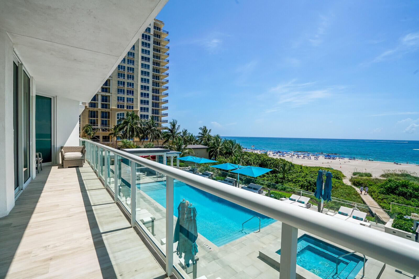 Step inside from your private elevator into the most premiere luxury residence at VistaBlue Singer Island. This furnished 3,642 sq ft en-suite four bed, 4.5 bath plus den, beachfront residence is being offered with two inside parking spaces. Adorned with designer pieces, this builder's model offers a chef's kitchen, Miele appliances, and over $400,000 in upgrades. Five-star amenities include 24 hour gated entry, onsite concierge, full beach service, elevated terrace with oceanfront pool & spa overlooking unparalleled views of the ocean. Exercise at the state-of-the-art fitness center including yoga room and sauna. Relax on your huge balcony and see the sunrise or the marching of newly born sea turtles.Celebrate timeless appeal and understated elegance.VistaBlue is your oasis!