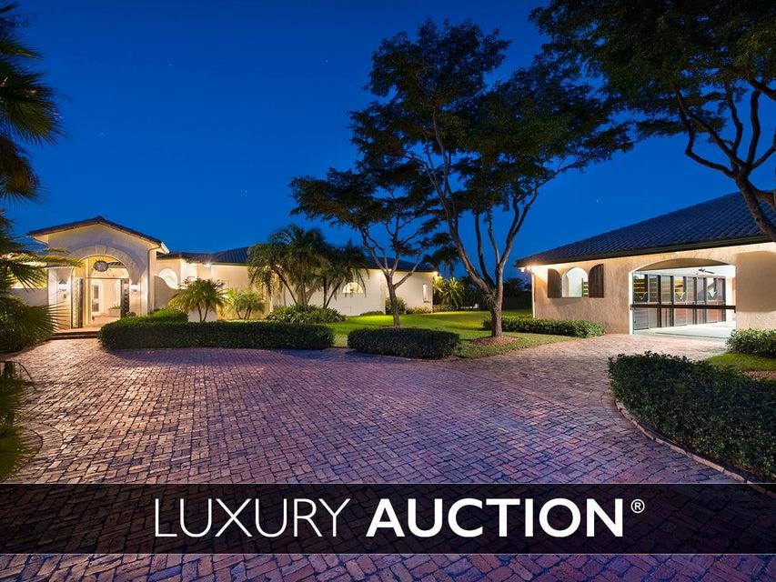''This elegant equestrian estate will be sold at LUXURY AUCTION® on May 5, 2018 in cooperation with Platinum Luxury Auctions! Selling At or Above a Reserve Price of Only $3 Million! List price here is FOR REFERENCE ONLY. Inquire for complete auction details.Beautiful property in 14.30 Acres. Courtyard 3/3 main house with 2/1 attached guest cottage and a 2/1 separated guest cottage. Built with top of line materials including impact windows, marble floors,gourmet kitchen 50'Lap Pool with spa surrounded by coral stone Etc. 12 stall barn with 12'x 12' stalls, 10 paddocks and a dressage ring with 5 stalls behind mirrors, grass arena,exercise track surrounding the whole property,with sprinkler irrigation & drainage. All measurements are approximate, please verify. DO NOT MISS! http://www.WellingtonLuxuryAuction.com

https://youtu.be/s5SAcTgCoJY