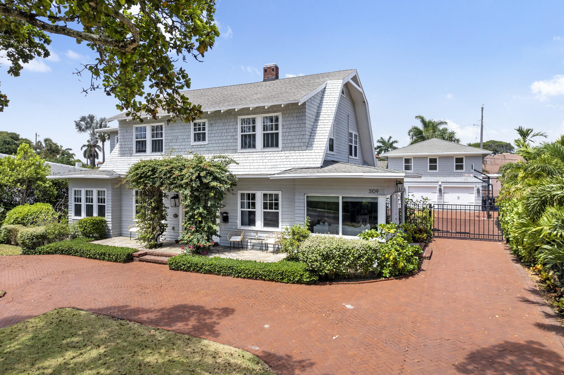 Historic 1931 shingle style home which was completely updated!  This light flooded, four bedroom family home has a large free-form pool, hot tub, large summer kitchen and covered entertainment area, a fabulous tree house, and also has a full sized one bedroom guest apartment above the garage.  SItuated in the terrific neighborhood of Prospect Park with a great school system, and has a waterfront park right across the street.  All this and only 7 minutes to Palm Beach Island or The Palm Beach International Airport All measurements are approximate and should be verified.