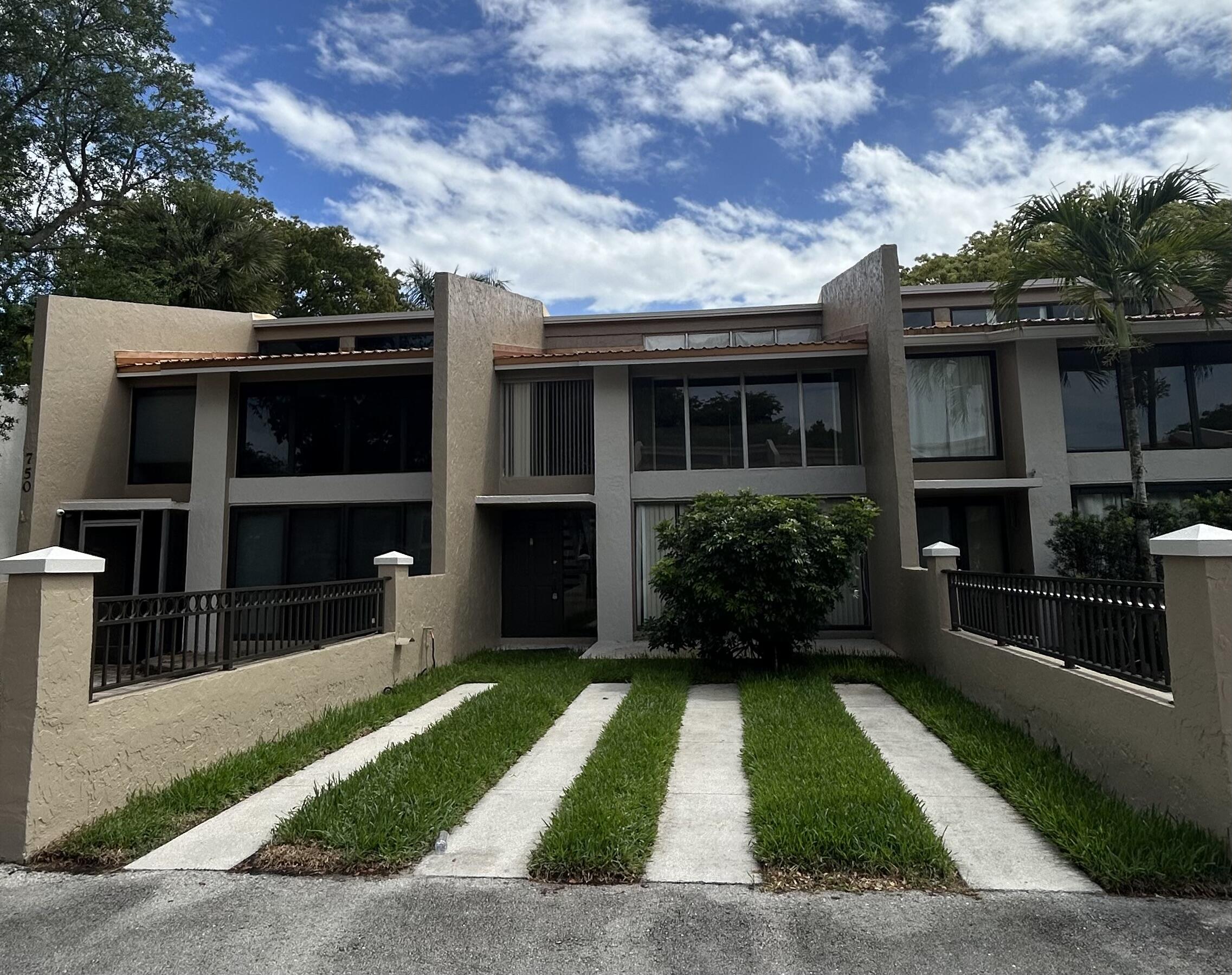 Welcome to the Majestic View community in Plantation! This two-bedroom plus loft, and 2 bathrooms, is a perfect blend of comfort and style. Step inside and be greeted by an open, airy layout bathed in natural light. The spacious living area flows seamlessly into an updated kitchen featuring stainless-steel appliances. Upstairs, the loft offers endless possibilities—use it as a home office, media room, or even a cozy reading nook. Both the primary suite and second bedroom overlook the lake. Outside, enjoy the tranquility of the neighborhood on your private patio, perfect for morning coffee or evening unwinding. Residents enjoy lush landscaping, located near Jacaranda Golf Club, shopping, dining, and major highways.