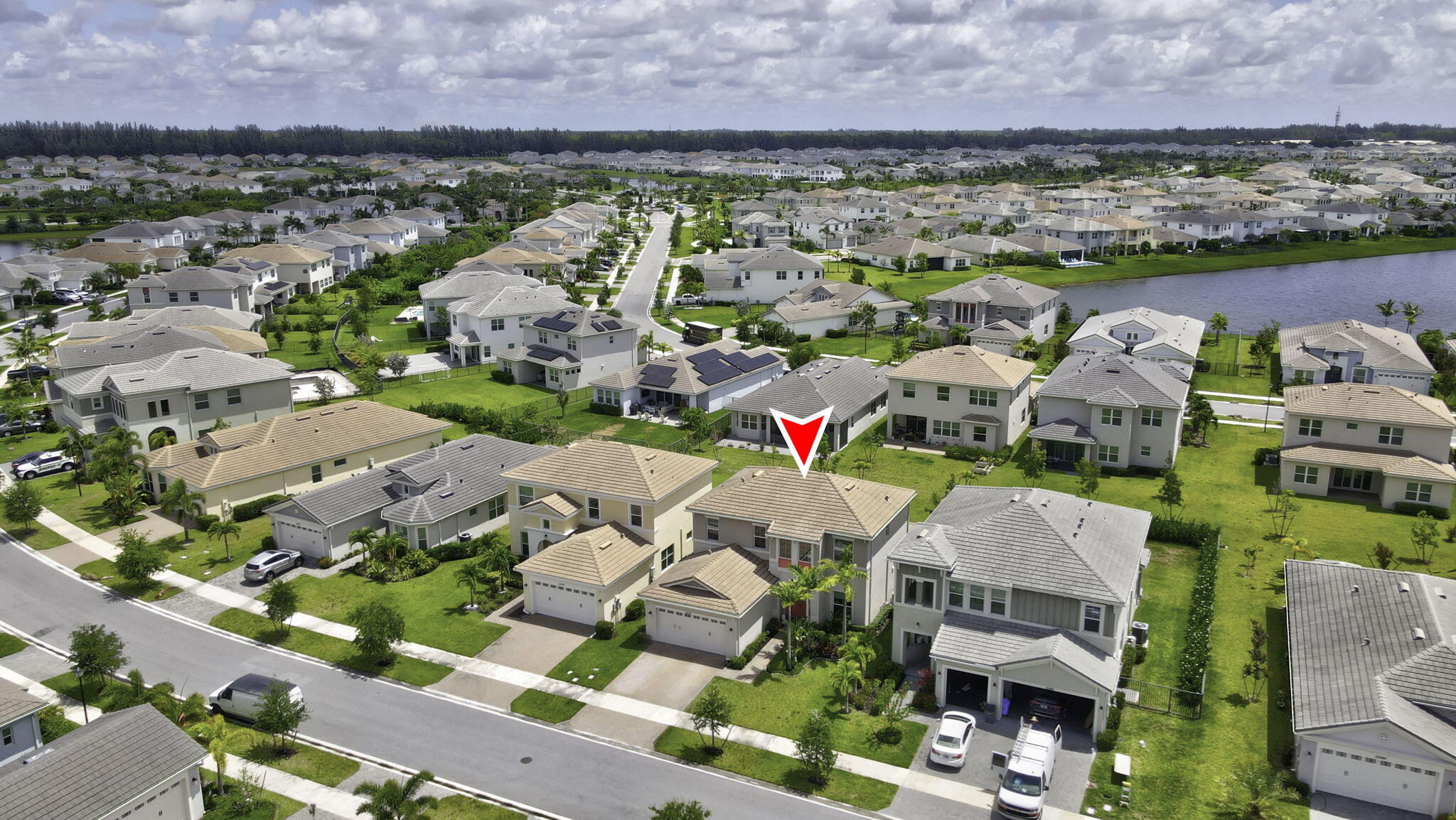 Welcome to Westlake — known as one of Florida's newest and fastest-growing cities!  This beautiful two-story home features 4 bedrooms, 3 full bathrooms, plus a den/office, with one bedroom and a full bathroom conveniently located on the first floor — perfect for guests or multi-generational living. The home offers a modern open-concept layout, laminate flooring upstairs with no carpet, impact windows and doors, and a spacious 2-car garage. Designed with comfort and functionality in mind, this home is ideal for both everyday living and entertaining.  Located in the highly desirable master-planned community of Westlake, residents enjoy resort-style amenities including an incredible Adventure Water Park, adult pool, basketball courts, BMX park, dog park, picnic areas, and so much more.  SELLER MOTIVATED BRING ALL YOUR REASONABLE OFFERS!