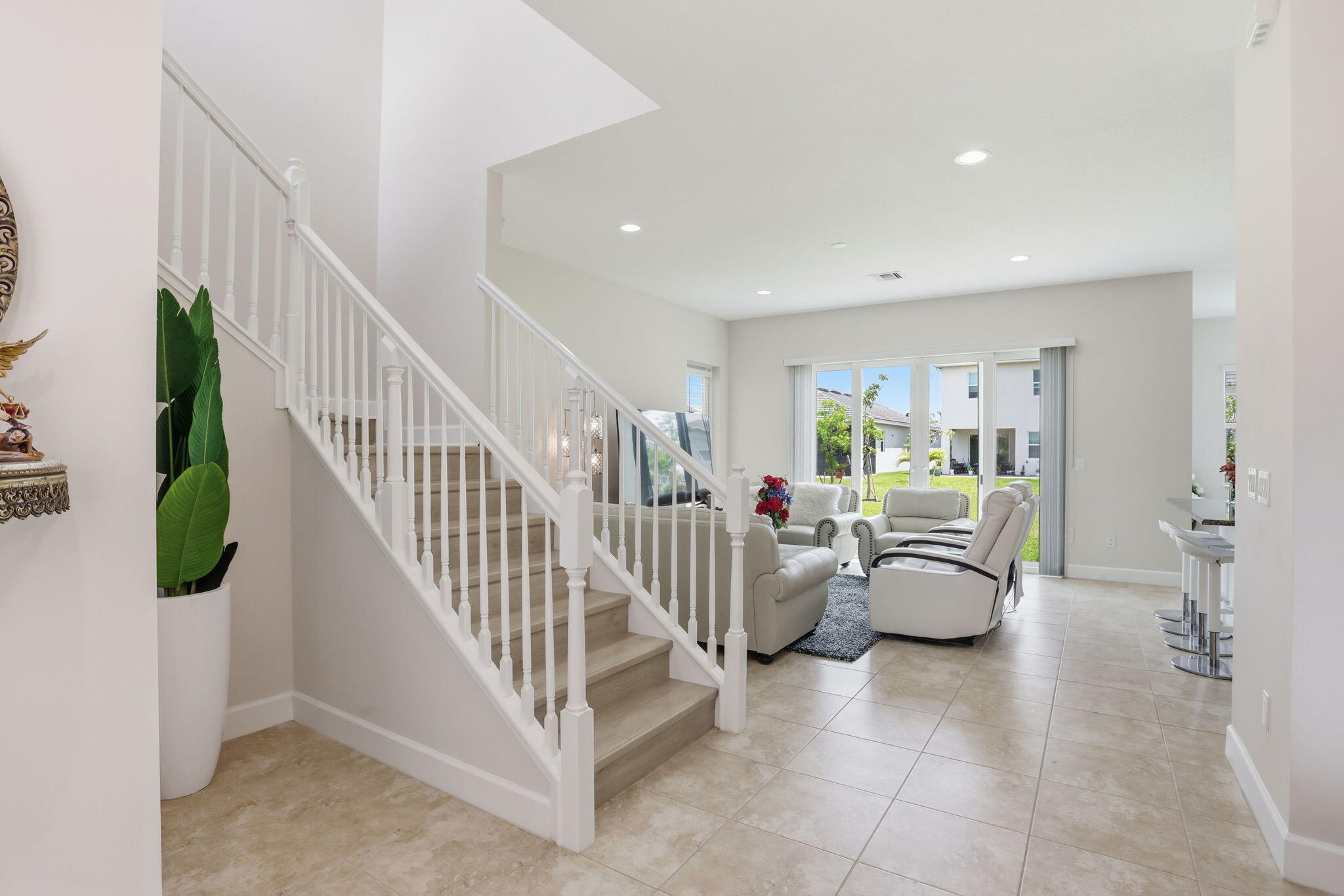 Welcome to Westlake — known as one of Florida's newest and fastest-growing cities!  This beautiful two-story home features 4 bedrooms, 3 full bathrooms, plus a den/office, with one bedroom and a full bathroom conveniently located on the first floor — perfect for guests or multi-generational living. The home offers a modern open-concept layout, laminate flooring upstairs with no carpet, impact windows and doors, and a spacious 2-car garage. Designed with comfort and functionality in mind, this home is ideal for both everyday living and entertaining.  Located in the highly desirable master-planned community of Westlake, residents enjoy resort-style amenities including an incredible Adventure Water Park, adult pool, basketball courts, BMX park, dog park, picnic areas, and so much more.  SELLER MOTIVATED BRING ALL YOUR REASONABLE OFFERS!
