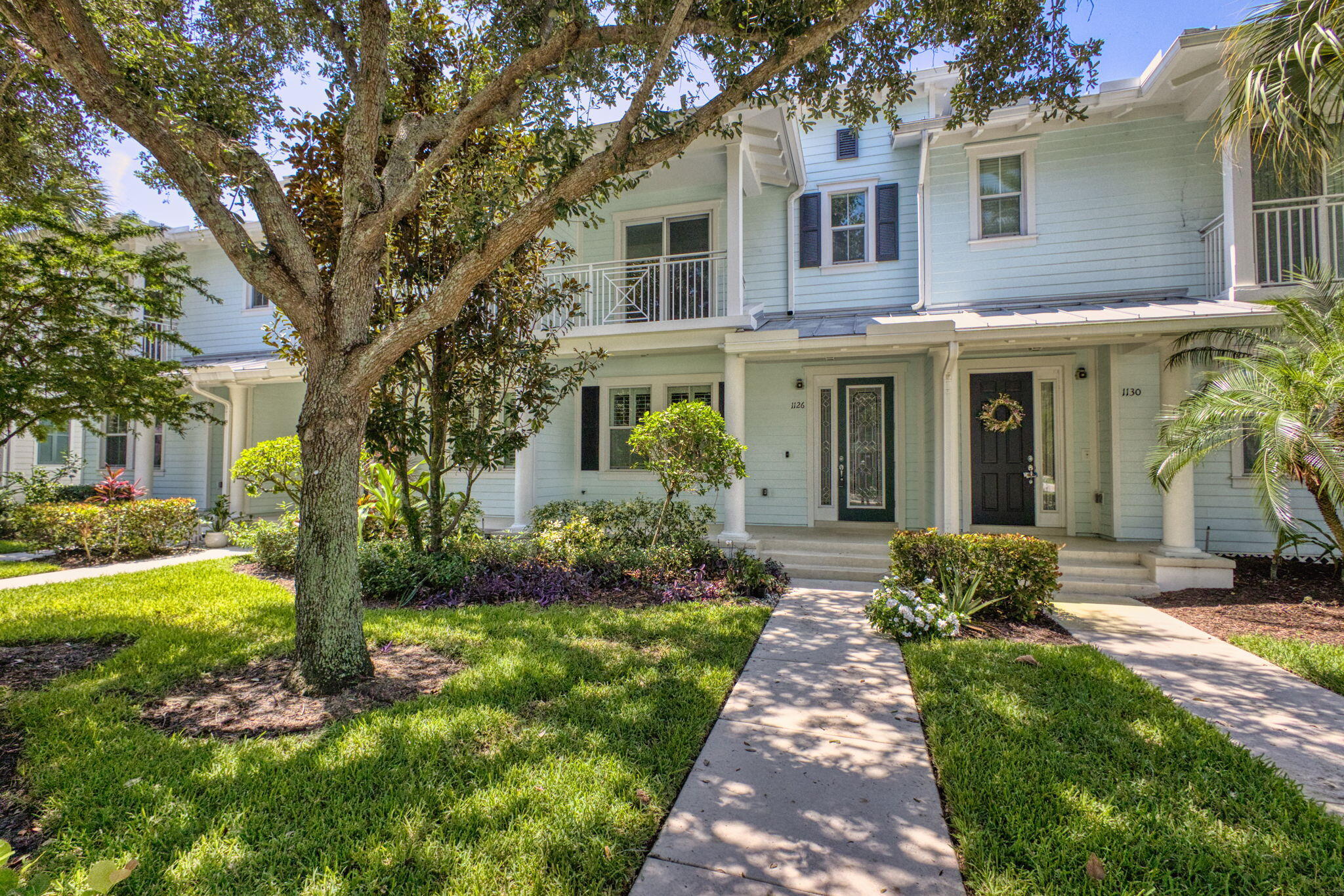 Beautifully updated 3-bedroom, 2.5-bath townhome with a 1-car garage featuring epoxy flooring. This home offers impact windows and doors, AC 2023, fresh interior paint, professionally painted white kitchen and bathroom cabinets, a brand-new washer and dryer, and newly installed vinyl flooring on the stairs and entire second floor. Enjoy community amenities including two pools and a fitness center. Hotwire cable and WiFi included. Ideally located close to downtown Abacoa, Roger Dean Stadium, the Amphitheater, food truck invasion nights, dining, shopping and entertainment. Just minutes from Jupiter's pristine beaches and only 20 minutes to PBI.