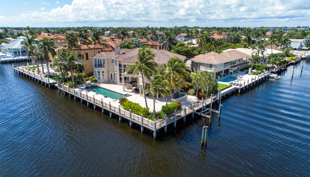 Gorgeous Gated Intracoastal Point Lot Estate with Magical Intracoastal Views overlooking the wide Intracoastal in Highland Beach.  One of the most beautiful, Intracoastal Point Lots in all of South Florida.  Elevator, Fireplace,  Soaring Ceilings, Hurricane Impact Glass, Large Lap Pool, Jacuzzi, Outdoor Summer Kitchen, tremendous Patio Space and Covered Loggia, Dockage for a Large Yacht, a Boater's Paradise.  Showplace! See survey and plans in document section.