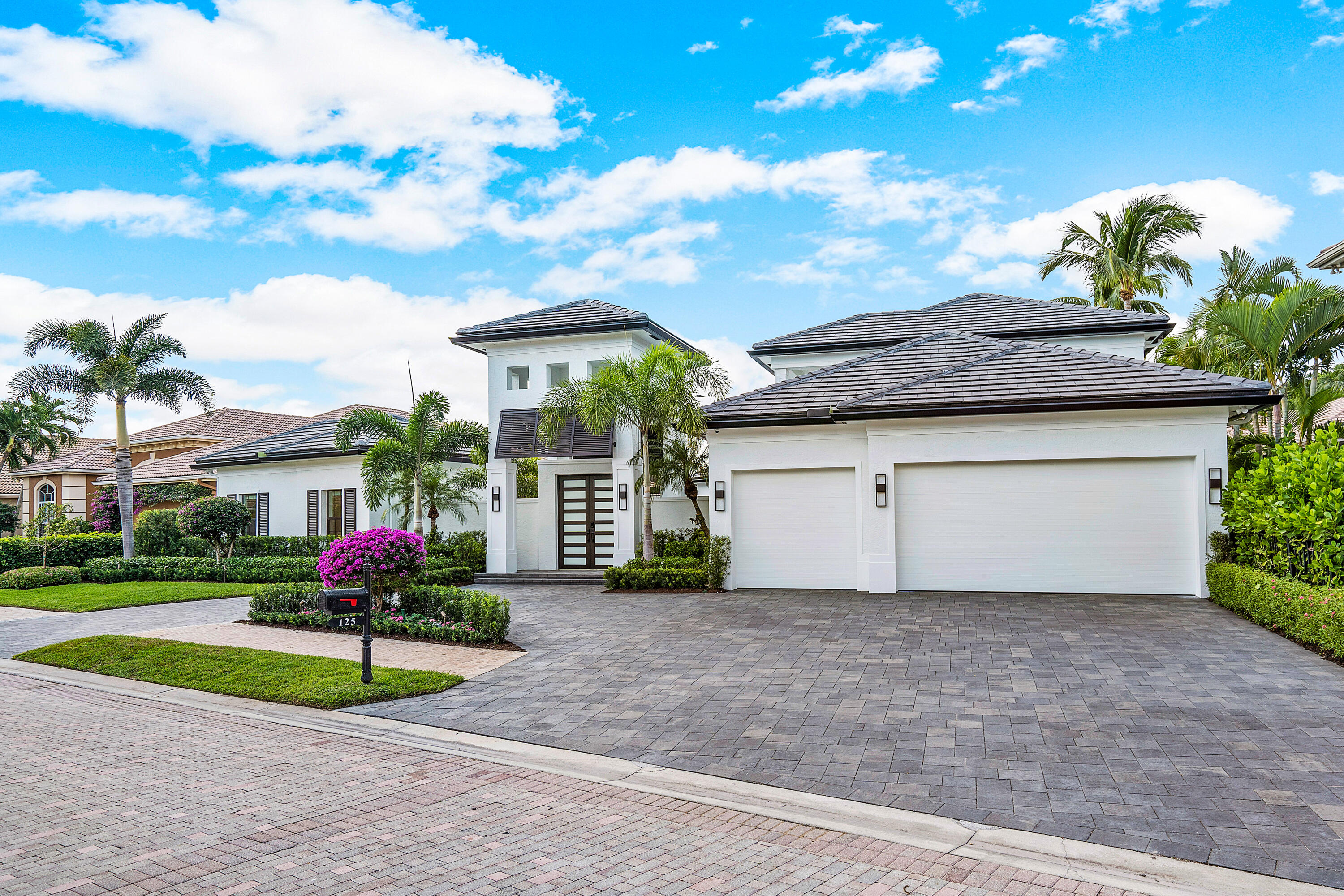 WORDS CAN'T DESCRIBE THIS PROPERTY! STUNNING ONE OF A KIND HOME IN THE RENOWNED BALLENISLES COUNTRY CLUB. LOCATED IN THE HIGHLY SOUGHT AFTER VINTAGEISLE NEIGHBORHOOD, THIS FULLY RENOVATED AND EXQUISITELY DESIGNED HOME WILL LEAVE YOU IN AWE.  INSPIRED BY OUTDOOR COASTAL LIVING, THIS HOME CENTERS AROUND A LUXURIOUS RESORT-LIKE COURTYARD WITH ELEGANT LANDSCAPING. INSIDE, THE HOME OFFERS EXPANSIVE CEILINGS, A FLOOR TO CEILING ACCENT WALL WITH FIREPLACE AND A WONDERFUL LAYOUT OF 5 BEDROOMS, 6 1/2 BATHS AND 2 OFFICES.  FEATURING NEW ROOF, IMPACT WINDOWS, HARDWOOD FLOORS, MIELE APPLIANCES, DEKTON COUNTERTOPS & BACKSPLASH, MOTORIZED SHADES/DRAPERY, A/C UNITS, GENERATOR, PUTTING GREEN AND SO MUCH MORE.  SOCIAL MEMBERSHIP AVAILABLE THAT CAN BE UPGRADED TO RACQUET, SPORT OR FULL GOLF.