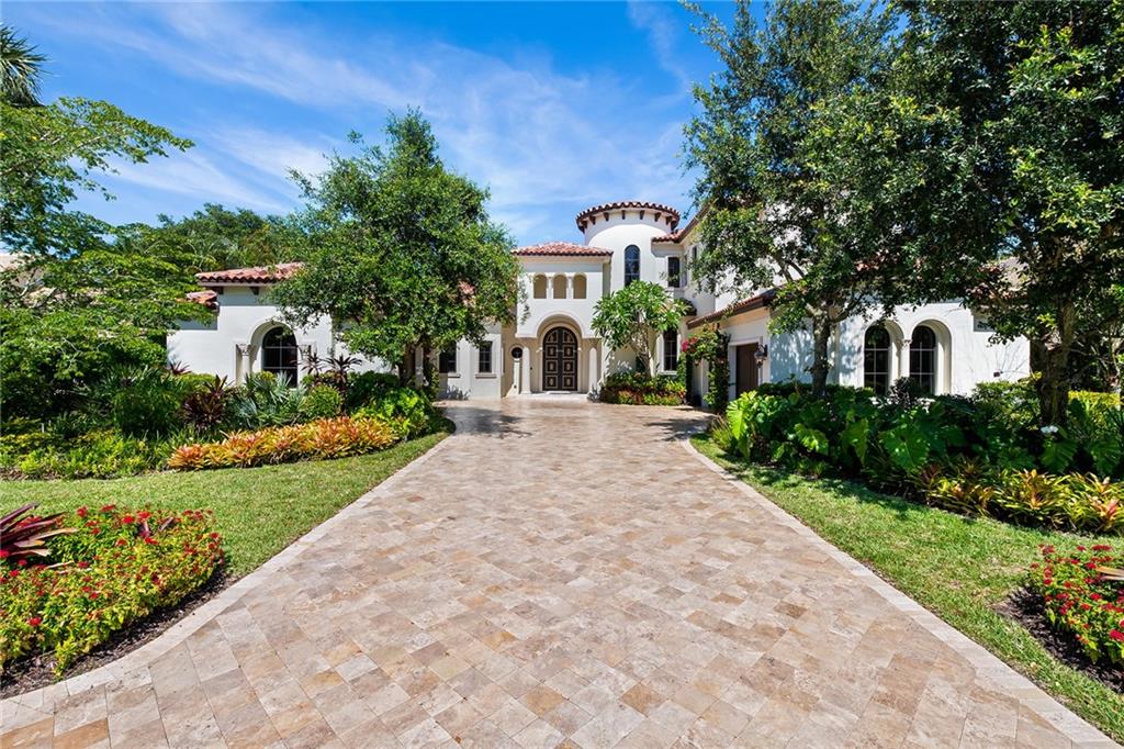 4100 Sanctuary Ln is a custom built estate located in Boca Raton's most exclusive and secure gated waterfront enclave, The Sanctuary. This 7,500 Sq Ft + 6 bedroom, 9 bathroom home is of uncompromised building quality and a stunning modern mediterranean style. Through the oversized double door entry and into the two-story foyer, a clean, bright & open floorplan welcomes you. The home features a chef's kitchen with top of the line Wolf & Sub Zero appliances, expansive first floor master suite, office & theatre room. Additional features include a 3.5 car garage, 660 bottle wine cellar, Control4, rare italian marble countertops throughout, 48KW Generac Generator, white ash oak & marble flooring . Lushly landscaped backyard features a saltwater pool, outdoor kitchen, &pecky cypress ceilings.