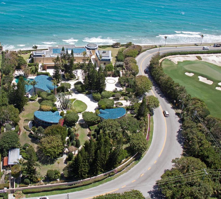 Unique prime development opportunity to own 300' of direct Ocean on 2.3 acres in Palm Beach.  Superior elevation.