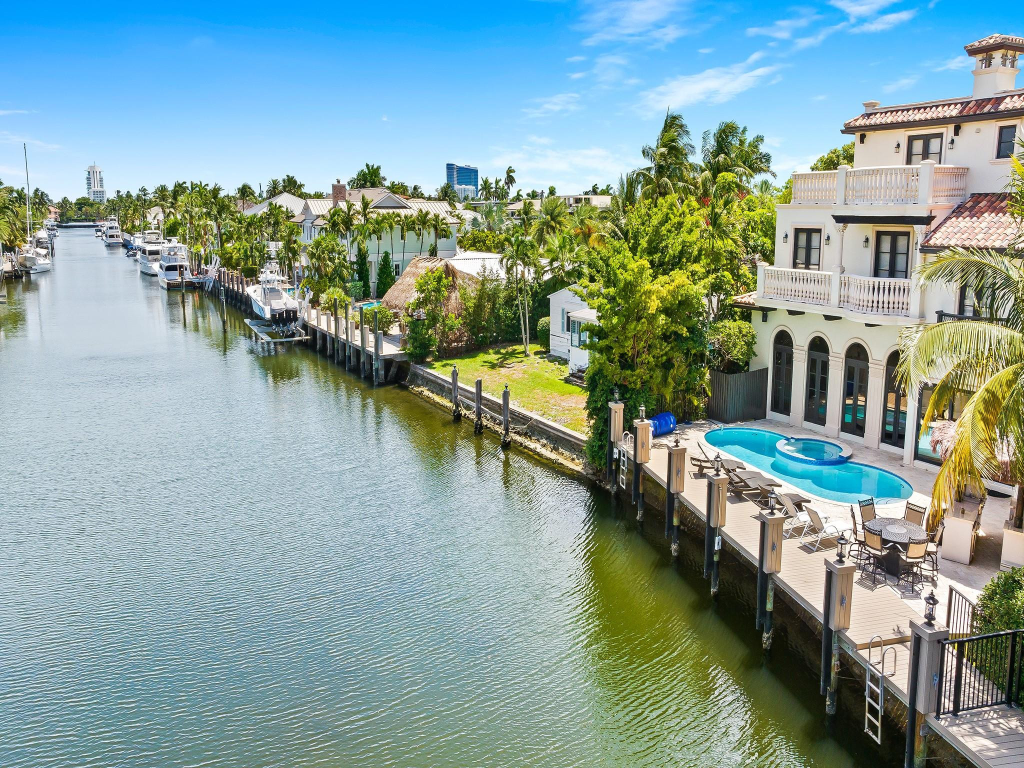 LAS OLAS ISLES NO FIXED BRIDGE DOCKAGE JUST 5 MINUTES TO PORT EVERGLADES! 92' OF PROTECTED DOCKAGE! JUST A SHORT WALK TO TRENDY LAS OLAS BLVD SHOPS OR THE DEEP BLUE WATERS OF THE ATLANTIC OCEAN! LARGE SPACIOUS THREE STORY QUALITY ESTATE HOME BUILT BY HART HOMES WITH 5,483 SQUARE FEET UNDER AIR AND 6,400 GROSS! CURRENTLY SET UP AS A 4 BEDROOMS BUT CAN EASILY BE CONVERTED TO 5 BEDROOMS! GAS GOURMET KITCHEN, WITH DOUBLE SINKS AND WOLF APPLIANCES! ELEVATOR, 2 FIRE PLACES AND WHOLE HOUSE GENERATOR! PRIME EAST EXPOSURE PROPERTY THAT PICKS UP THE CONSTANT SEA BREEZES FROM THE SOUTH EAST. SITE FACES EAST! PREMIUM BREEZY EXPOSURE PERFECT FOR GRAND OUTDOOR SOUTH FLORIDA LIVING! NEW TIKI HUT BY THE POOL STAYS! COME TOUR YOUR NEW WATERFRONT PARADISE TODAY! POWER LINES WILLBE BURIED SOON!