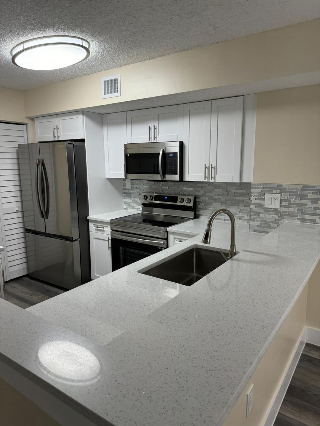 Stunningly remodeled 3-bed, 2-bath condo on the 2nd floor. Every inch of this turnkey unit exudes sophistication, from the updated kitchen, new stainless-steel appliances to the meticulously renovated bathrooms and the convenience of an in-unit washer and dryer. Beautiful new flooring that flows seamlessly throughout, leading to a private large balcony offering a breathtaking view. The spacious open floor plan is enhanced by a master bedroom featuring a walk-in closet. Nestled within a gated community with an array of amenities, including a clubhouse, a pristine pool, an exercise room, tennis courts, and a charming BBQ and picnic area. Its prime location near the Promenade, shops, restaurants, a movie theater, casino, highways, and great schools ensures both luxury and accessibility. Showing assist