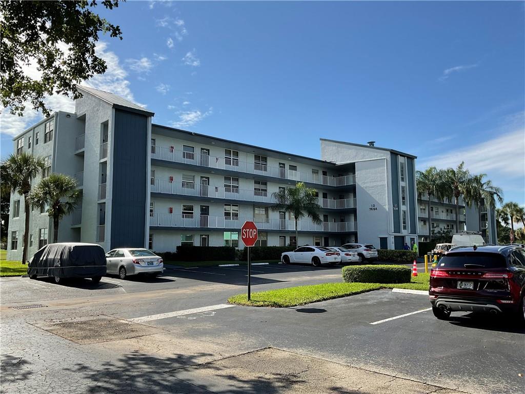 Rarely available this super bright Corner Penthouse SE Exposure unit with water and golf views! Beautiful screened  patio with roll down shutters. All windows have Impact Glass. Enjoy the Clubhouse, Pools, Gym, Billiard Room, Sauna and Library. One owner must be a minimum of 55 years old. Association fee includes water, cable, pest control, amenities and reserves. Leasing permitted after 2 years of ownership.