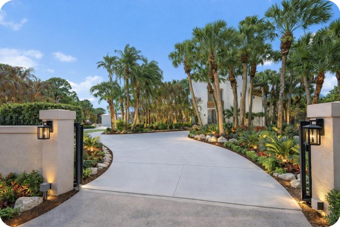 A rare offering in Palm City! Welcome to an exceptional Waterfront Estate, where privacy, space and coastal living come together on over 2 plus acres of Lush Tropical Beauty. This expansive residence offers more than 8,000 sf of living space, featuring 6 bed, 8.5 bath. The main home features 6,008 Living sf offering 4 bedrooms, 5.5 bathrooms plus a 3.5 garage.  Home is designed for comfort and entertaining. The guest house featuring 2,197 Living sf offering 2 bed, 3 bath and a 1 car garage. Outdoors, enjoy a true Florida Lifestyle with a private dock with boat access to the Ocean and Gulf. A detached oversized 900 sq ft garage for boats and RVs. Home offers Luxury Bath Features, Custom Finishes, Elevator access for convenience, Luxury Kitchen Appliances. Pool not included but can be added. Final touches are still being completed.