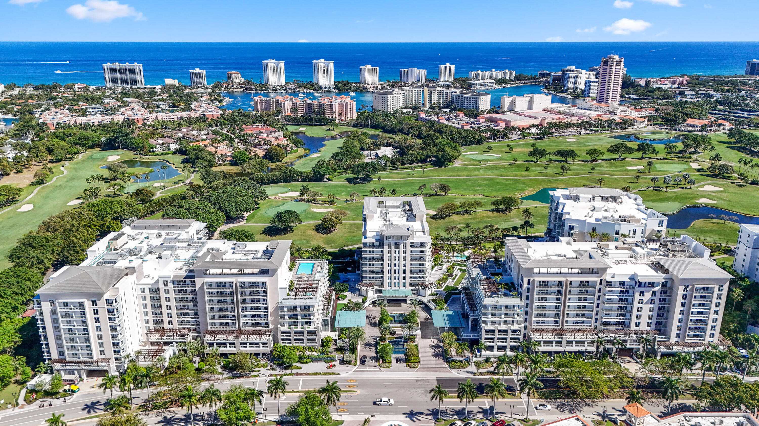 The elegance of resort-inspired living finds its finest expression at 210 SE Mizner Boulevard, Residence 703, located within the exclusive boutique 210 center Tower at ALINA Residences Boca Raton, the award-winning luxury condominium community developed by El-Ad National Properties. Completed in 2024, this designer-appointed 3-bedroom, 3.5 bath residence offers 3,241 square feet of living space and 3,914 total square feet. One of only four residences on its floor, Residence 703 is accessed through a private elevator foyer and offers contemporary architecture, thoughtfully curated interiors, and an exceptional downtown Boca Raton location. Professionally designed and furnished by renowned interior designer Susan LaChance, the residence showcases timeless contemporary design through bespoke architectural details, custom millwork, designer lighting, handcrafted cabinetry, elegant wall treatments, custom mirrors, fully finished closets, and thoughtfully designed built-in storage throughout.  Every finish has been selected to create a refined yet inviting atmosphere that is equally suited for everyday living and elegant entertaining. A fully integrated, hardwired Crestron A/V system affords refined, whole-residence control of audio, video, and smart home features, delivering a seamless and elevated turnkey living experience.   The expansive great room flows effortlessly into the formal dining area and custom-designed bar, creating an inviting setting for intimate dinners, lively gatherings, or quiet evenings at home. At the heart of the residence, the gourmet kitchen is thoughtfully designed for both everyday living and entertaining, featuring premium Gaggenau appliances, custom cabinetry, porcelain countertops and backsplash, wine refrigeration, an oversized center island, and a walk-in pantry with custom shelving. Whether preparing a casual breakfast or hosting guests, the kitchen remains beautifully connected to the surrounding living spaces, allowing every occasion to unfold naturally.    Two expansive covered terraces extend the home's living space outdoors, offering an inviting setting to begin the day with coffee or unwind in the evening while taking in views of the beautifully landscaped grounds, tranquil water features, and Boca Raton's spectacular sunsets. Complete with a summer kitchen and built-in electric grill, the terraces create an effortless indoor-outdoor lifestyle designed for year-round entertaining.    Designed as a private sanctuary, the primary suite offers a peaceful retreat from the day, featuring dual custom walk-in closets and a spa-inspired marble bathroom thoughtfully designed for two. The luxurious bath includes dual vanities, two private water closets, a freestanding soaking tub, and an oversized walk-in shower with dual shower heads, creating a refined, wellness-inspired experience. A spacious guest suite provides exceptional comfort and privacy for family and visitors, while the third bedroom has been thoughtfully reimagined as a sophisticated executive office with custom built-ins, offering flexibility to serve as an additional bedroom if desired.     Residents of ALINA 210 enjoy amenities reserved for the boutique building, including a resort-style swimming pool, fitness center, spa with steam and sauna, resident lounge, card room, concierge services, valet, and beautifully landscaped outdoor gathering spaces. Owners also enjoy access to the extensive amenities throughout the ALINA community, including additional pools, wellness facilities, social spaces, and walking paths surrounded by lush gardens and tranquil water features.    Located adjacent to Royal Palm Place, ALINA Residences offers convenient access to Boca Raton's acclaimed restaurants, luxury shopping, art galleries, entertainment venues, private clubs, championship golf courses, and pristine Atlantic beaches. Residence 703 presents an exceptional opportunity to experience a refined lifestyle within one of Boca Raton's most desirable residential addresses.