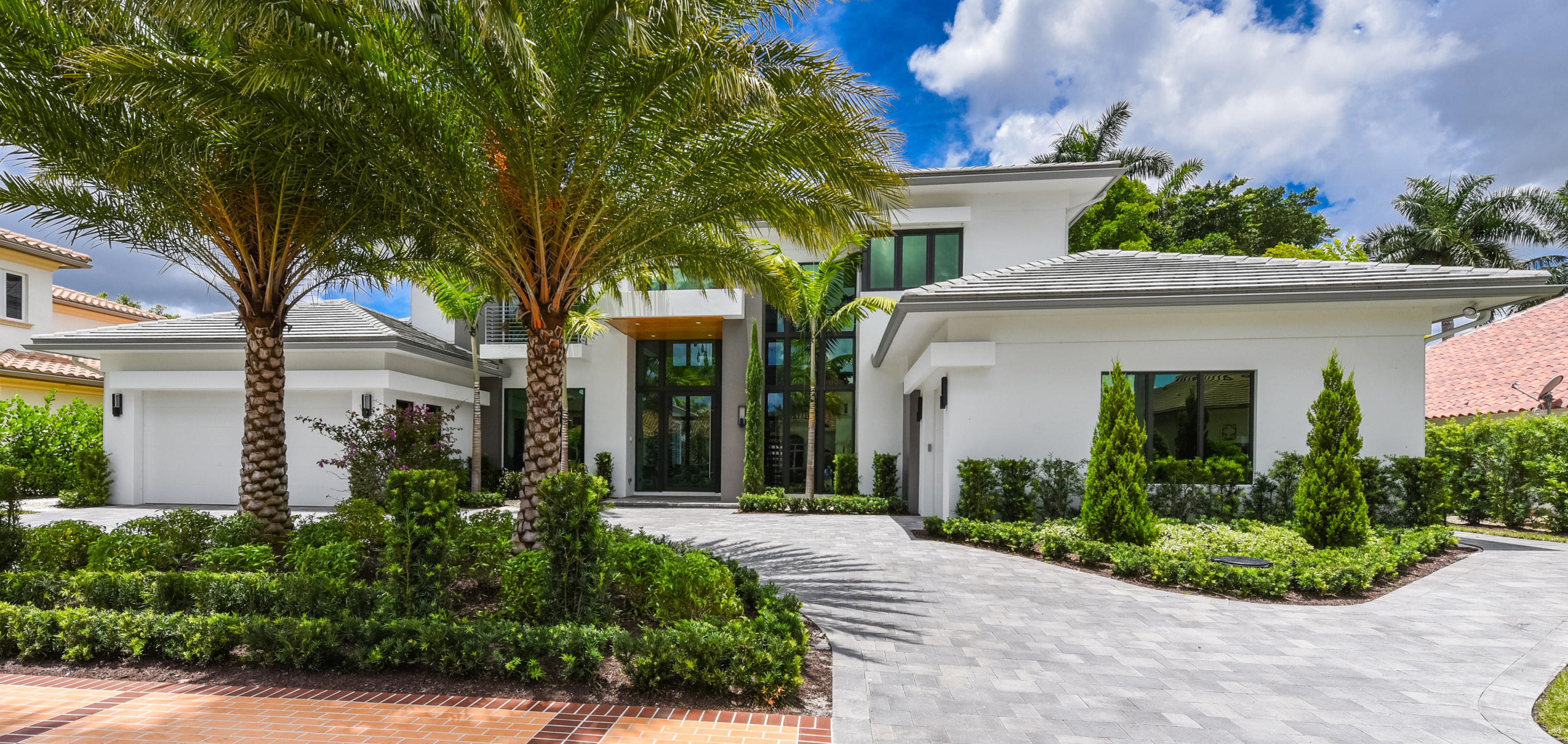 Luxury and sophistication define this NEW Construction contemporary style estate being offered fully furnished. This strikingly elegant residence, with over 6300 sq ft of living area features magnificent architecture and exquisite custom finishes throughout. The grand entrance foyer with floating signature staircase opens to a centrally located great room with stunning floor to ceiling windows creating the ultimate atmosphere for entertaining or casual relaxation. A stunning glass wine room separates this space from a gourmet chef's kitchen, family room and dining areas. A luxurious master suite features his and her baths and generous closets. Views from the interior overlook sweeping golf course vistas,  a sparkling resort style pool, spa, covered loggia and summer kitchen. Also located on first floor is an office/media room. Three additional spacious bedroom suites and a game/ media room or fifth bedroom are located  on the second floor.

Property Details and Amenities:
Large 40" x 120" polished porcelain tile on main living area.
Carpeting in club room downstairs and 2nd, 3rd, and 4th bedroom upstairs.
Wood flooring in master and upstairs media and hall area.
All countertops are quartz.
Impact windows and doors throughout.
Elevator.

Kitchen:
Wolf appliances, 36" contemporary gas cooktop, 2 single wall ovens, Wolf coffee system and steam oven.
Quartz island countertop with 3 inch mitered edge.
Island sink, and paneled microwave drawer with paneled dishwasher.
Contemporary hood above cooktop.

Covered patio 18 x 13.5 with a BBQ grill and cabana bath leads to the pool. 

Pool is 22 ft x 14 ft with a 6 ft x 6 ft spa.

Four A/C systems.