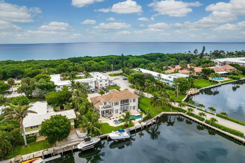 Seconds away from the ocean, this custom Mediterranean gem located on the intracoastal at 58 River Drive in Ocean Ridge offers all the best in waterfront living. Rustic wooden double doors open into a grand open floor plan with soaring high ceilings and beautiful natural light that pours through countless impact glass windows and doors. A newly updated kitchen features new Wolf Appliances and white quartz countertops along with recessed LED lighting. This two story, 5 bedroom, 6 bathroom home features two master suites with one on each floor. A brand new deep water dock extends into the Spanish River accommodating a large vessel, offering quick ocean access from the beautiful backyard complete with a recently redone salt water pool and spa. Other newly appointed amenities of this home include elaborate security cameras, full house generator and power shades  
 
Ocean Ridge is an exclusive waterfront community nestled between  Boca Raton and Palm  Beach. Minutes from world class Atlantic and Worth Avenues, and just a short drive away from Palm Beach Island, this desirable neighborhood offers unmatched privacy and access to the best that South Florida has to offer.