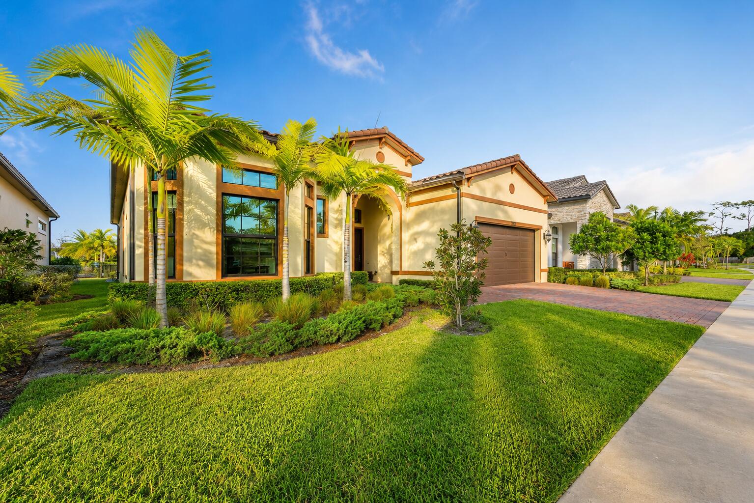 Welcome to this modern lakefront home in the highly desirable Falls at Parkland. Built in 2023, this one-story residence offers 3 bedrooms, 2.5 bathrooms, and a 2-car garage, combining elegant finishes with today's most sought-after features.  The open-concept floor plan is highlighted by a stylish kitchen featuring granite countertops, a spacious island, white cabinetry, a pantry, and stainless steel appliances, including a gas range. The primary suite offers tranquil lake views, dual vanities, and generous closet space, while all bedrooms feature laminate flooring and large walk-in closets.  Designed for comfort and entertaining, the home boasts soaring ceilings, impact windows and doors, and a private patio overlooking the lake—an ideal setting for enjoying breathtaking sunset views. Residents enjoy resort-style amenities, including a clubhouse, fitness center, pool, spa, pickleball, theater, ballroom, café, and more—perfect for an active and vibrant lifestyle.