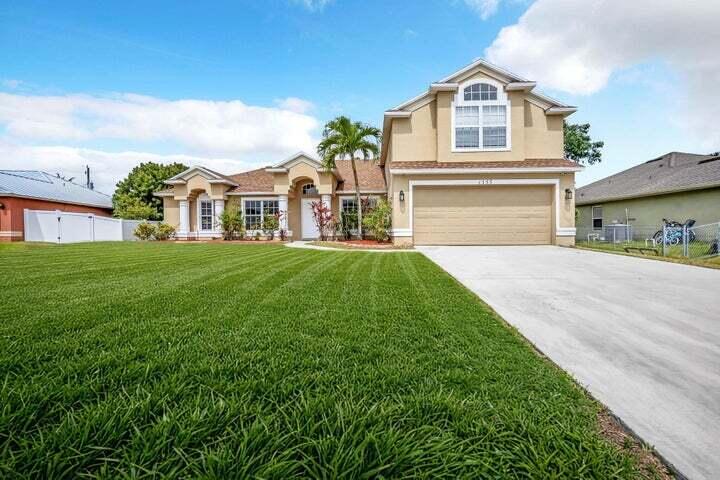 HUGE 5 BEDROOM /3 BATHROOM HOME SET BACK FROM THE STREET, ON A HUGE, ELEVATED LOT. TILE FLOORS THROUGHOUT. PLENTY OF ROOM FOR A POOL.  VERY QUIET STREET, WITH GREAT NEIGHBORS.  BRAND NEW ROOF 2025.  HUGE TRAIN A/C - 2018.  WATER HEATER - 2020. SPRINKLER SYSTEM. CAMERA SECURITY SYSTEM.     **NO FHA**