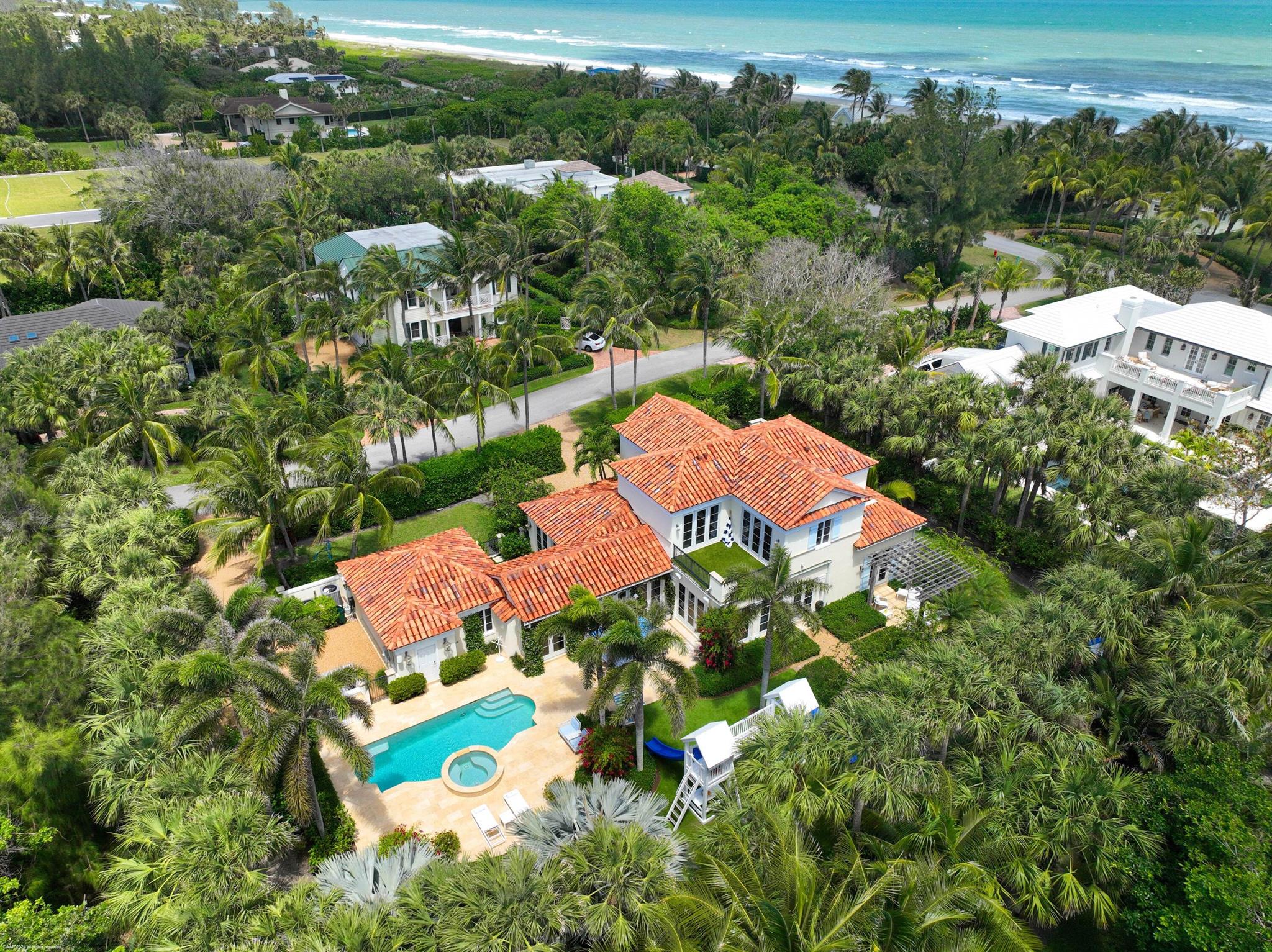 Step into serene elegance with this meticulously maintained 5-bedroom residence just moments from the stunning Jupiter Island Beach. Nestled on the tranquil North End of Jupiter Island, this home offers an unparalleled coastal lifestyle while providing easy access to the vibrant local community, including premier shopping, fine dining, schools, and world-class golf courses—all conveniently accessible via Bridge Road.
This sophisticated oasis embodies refined living, perfectly blending seclusion with accessibility. Whether you're looking to relax in your beautifully appointed living spaces or entertain guests in style, this home caters to your every need.