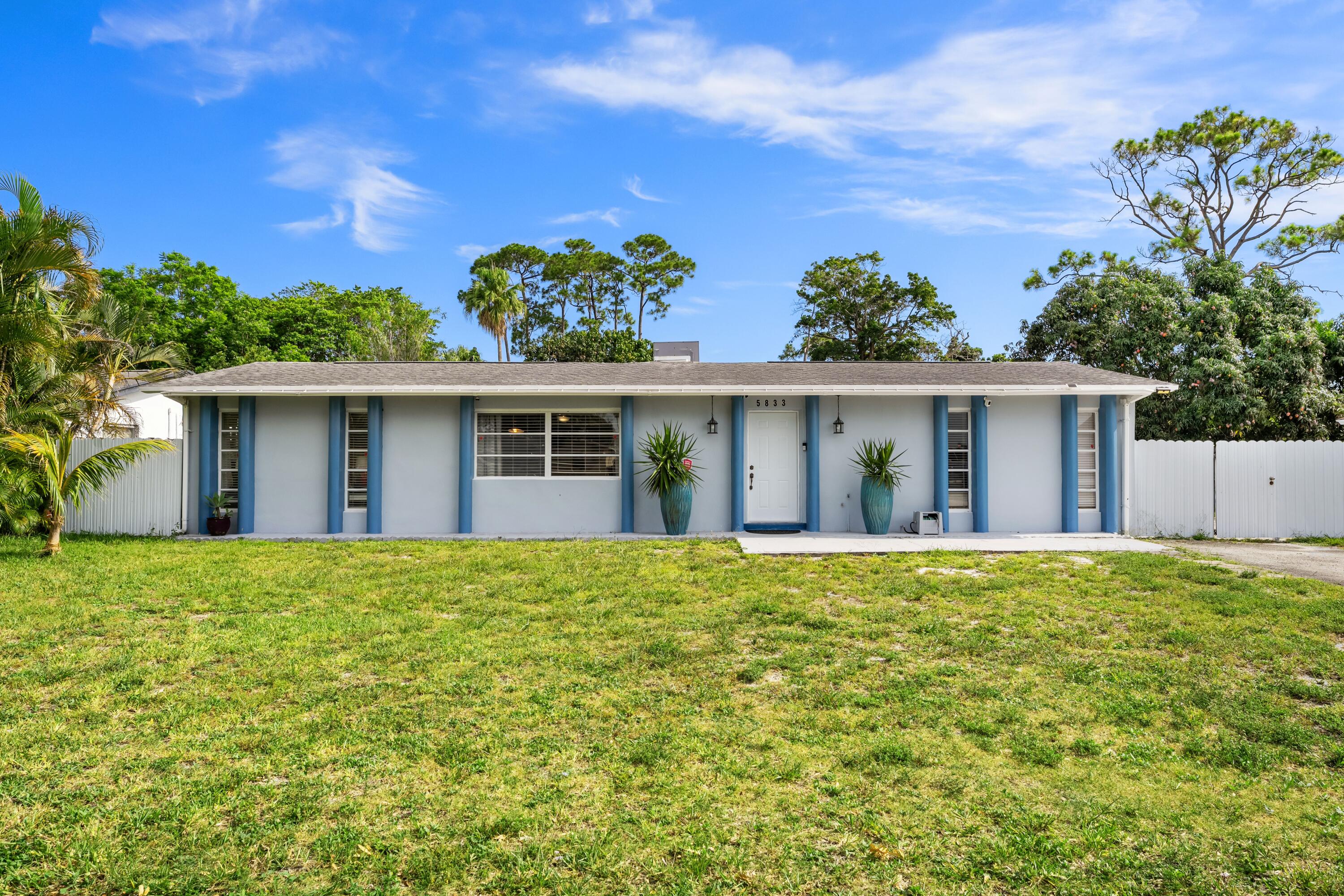 Welcome to this well-maintained 4-bedroom, 2-bathroom home situated on a generous 0.46-acre lot with a desirable split floor plan that offers added privacy and functionality. In addition to the three bedrooms, there is a converted fourth room currently set up as an office, providing flexible space to suit a variety of needs. Enjoy Florida living with a sparkling pool and screened-in patio, perfect for outdoor relaxation and entertaining. The updated kitchen features modern finishes and ample workspace, while the newer A/C system and water heater provide added peace of mind. The expansive property includes a large driveway with plenty of parking and offers room for RVs, boats, trailers, and other recreational vehicles. With its oversized lot, versatile layout, thoughtful updates, and pride of ownership throughout, this property presents a unique opportunity with both indoor comfort and outdoor flexibility.