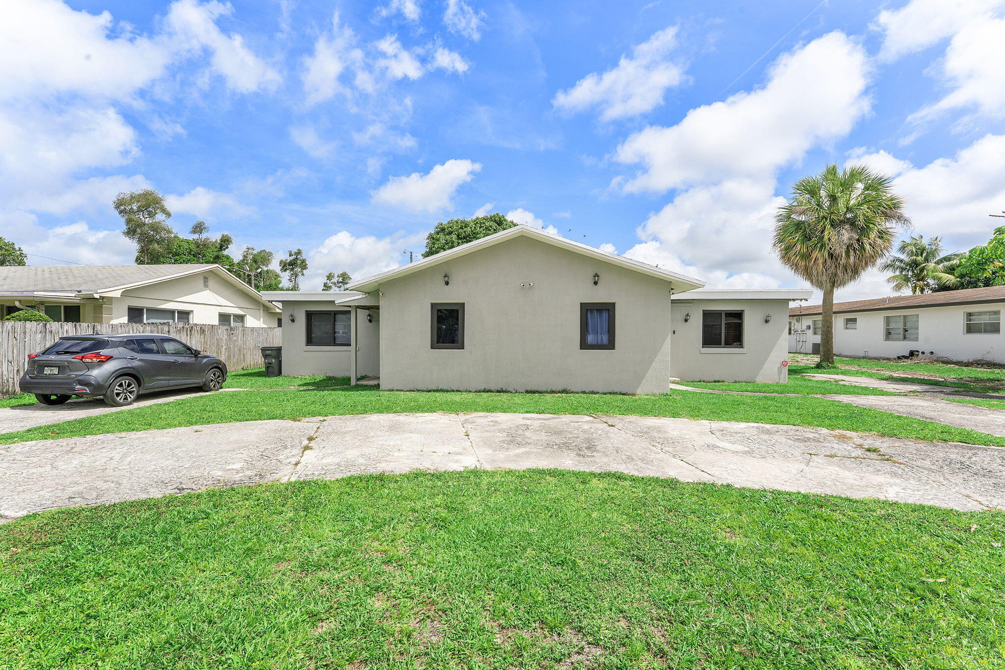 This income-producing duplex presents a fantastic opportunity for both investors and owner-occupants seeking flexibility, space, and long-term potential in a convenient West Palm Beach location. Situated on a generously sized lot with ample parking and outdoor space, this property features two separate units—4727 and 4729 Myrtle Lane—each offering comfortable layouts, updated features, and private entrances. Unit 4729 is currently tenant-occupied, providing immediate rental income potential.  Continuation.... Inside, you'll find bright and functional open-concept living and dining areas with neutral tile flooring throughout, recessed lighting, and a seamless flow perfect for everyday living and entertaining. The updated kitchens feature granite countertops, rich wood cabinetry, stainless steel appliances, modern fixtures, and plenty of cabinet and prep space, creating a stylish yet practical environment for cooking and gathering.  The property offers spacious bedrooms and well-appointed bathrooms, making each unit comfortable for tenants or extended family living arrangements. Large windows throughout provide excellent natural light, while the practical floor plans maximize usable living space. The expansive backyard offers additional outdoor potential with room for entertaining, relaxing, or future enhancements.  Whether you're looking to expand your rental portfolio, generate passive income, or live in one unit while renting the other, this duplex delivers versatility and value. Conveniently located near major roads, shopping, dining, schools, and local amenities, the property offers easy access to everything West Palm Beach has to offer.  Property features include:  Duplex with two separate units: 4727 & 4729 Myrtle Lane Unit 4729 currently tenant-occupied Spacious living and dining areas Updated kitchens with granite countertops Stainless steel appliances Tile flooring throughout Recessed lighting Large backyard and outdoor space Ample parking Excellent investment or owner-occupant opportunity  A rare chance to own a multi-unit property with strong income potential, functional layouts, and desirable upgrades in a growing West Palm Beach location.