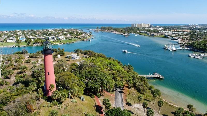 One of the most spectacular interior  homes totally renovated in 2019 located  in highly sought after Jupiter Inlet Colony. No expense was spared on this meticulously  maintained one of a kind home in the 
desirable enclave located on the southern tip of Jupiter Island. Minutes to Beach, Marina & Inlet. The living area included great room with French oak  flooring soaring ceilings & many windows for a light bright open concept. Grand Primary bedroom with EnSuite Bath is privately situated. The upper level also boasts French oak wood floors enhancing a 2nd Primary Bedroom with EnSuite Bath plus two generously sized Bedrooms/Bath.4th Br can also be office/bedroom. Jupiter Inlet is an exclusive town of 240 homes bordered by the Atlantic Ocean, Jupiter Inlet & Intracoastal.Buy NOW WILL NOT LA The town offers beach access for all homes and this homesite is located near the northern path to the ocean.The town is surrounded by the Atlantic Ocean, Jupiter Inlet and Intracoastal waterway.Jupiter Inlet Colony is Jupiter Island's best kept secret. The community has 240 residential single family parcels, one way in and out its own police department. The town is nearby Jupiter, Florida where it awaits requiring no sacrifice for convenience. A top destination for tennis and golf. Jupiter is home to some of the most renowned golf courses in the country. The historic Jupiter Inlet Lighthouse and Juno Pier are testaments to the community's long-standing relationship with aquatic pursuits...world class diving and fishing await just offshore. Minutes from Palm Beach International Airport and Stuart Jet Port .For those placing an emphasis on a private, pastoral setting within close proximity to the amenities of an idyllic community like Jupiter, Florida this is an unparalleled offering.