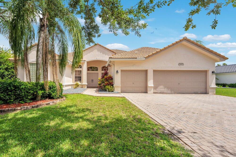 Room to live, room to grow!  This 4-bedroom, 3-bath plus den beauty sits on one of the largest lots in Windsor Bay, a safe gated community in the heart of Coral Springs. Three-car garage, dual walk-in closets, spacious kitchen, and a stunning lake-view backyard make everyday living feel like a retreat. Top-rated schools, easy Sawgrass access, and endless shopping nearby. Schedule your private showing today!