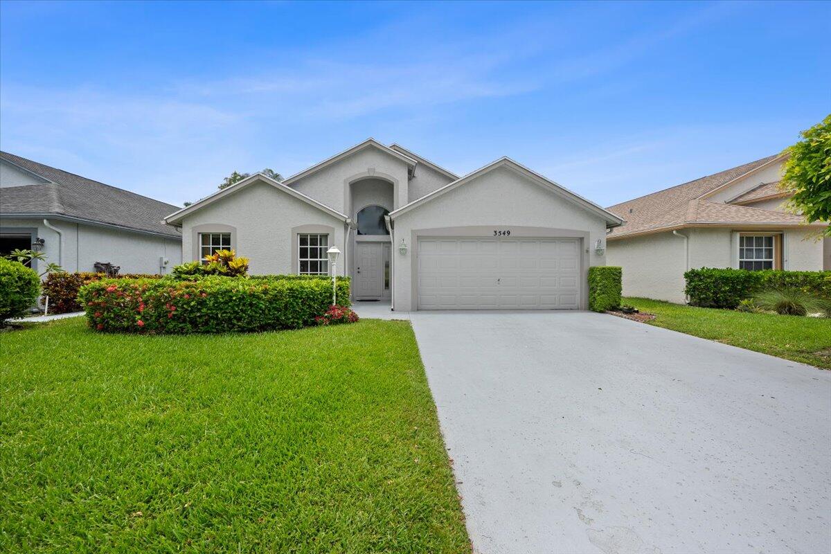 Welcome to Cypress Lakes, a gated active adult community offering a variety of activities, clubs, social events & amenities. Residents enjoy a clubhouse, fitness center, pool & hot tub, tennis & pickleball courts, plus free access to community's 18-hole executive golf course with no membership dues or greens fees. This charming single-story home features soaring ceilings, 2 bedrooms, 2 bathrooms, & a private office with elegant beveled-glass French doors that can serve as a den or 3rd bedroom. Spacious living & family areas are ideal for everyday living & entertaining, while the 2-car garage offers added convenience. Easy access to shopping, dining, beaches, the Kravis Center, CityPlace & the Palm Beach International Airport. Enjoy the South Florida lifestyle in this vibrant community.