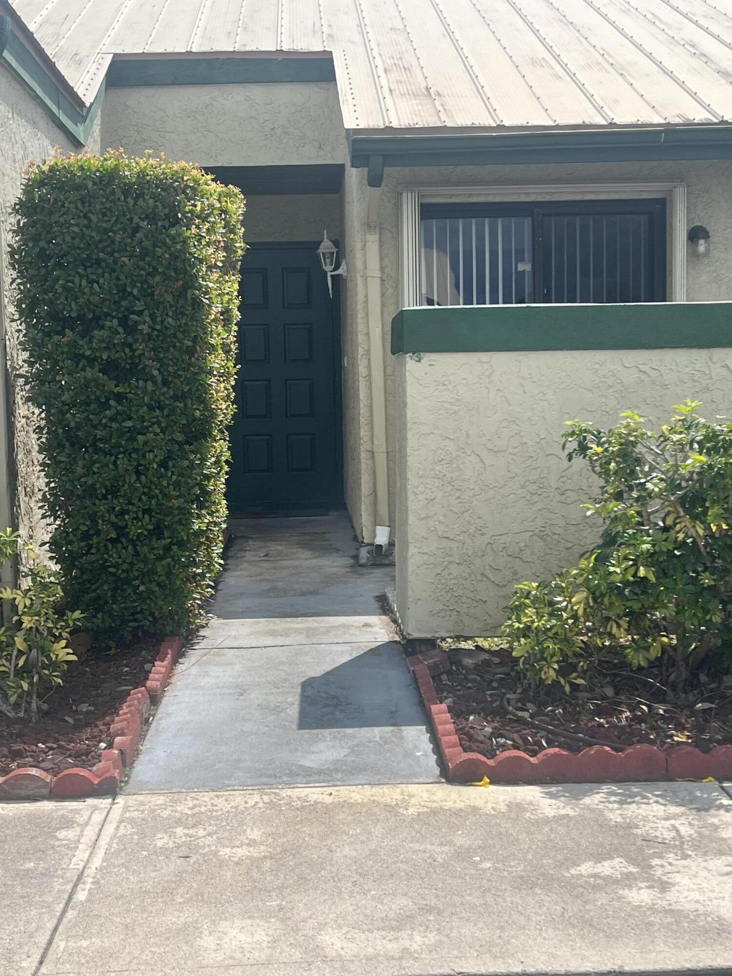 Charming and affordable Villa/Townhome built in 1983. This 2/1 residence offers comfortable living with a functional layout, perfect for first-time home buyers, downsizers, or investors. Conveniently located near parks, shopping, dining, and major roadways, making everyday living easy and accessible.  Frame-and-stucco construction with a Metal roof installed in 2018.  The A/C was updated in  August of 2020.  Low maintenance living with great potential to make it your own!  Don't miss the opportunity to own in a desirable and growing area - Schedule your showing today!