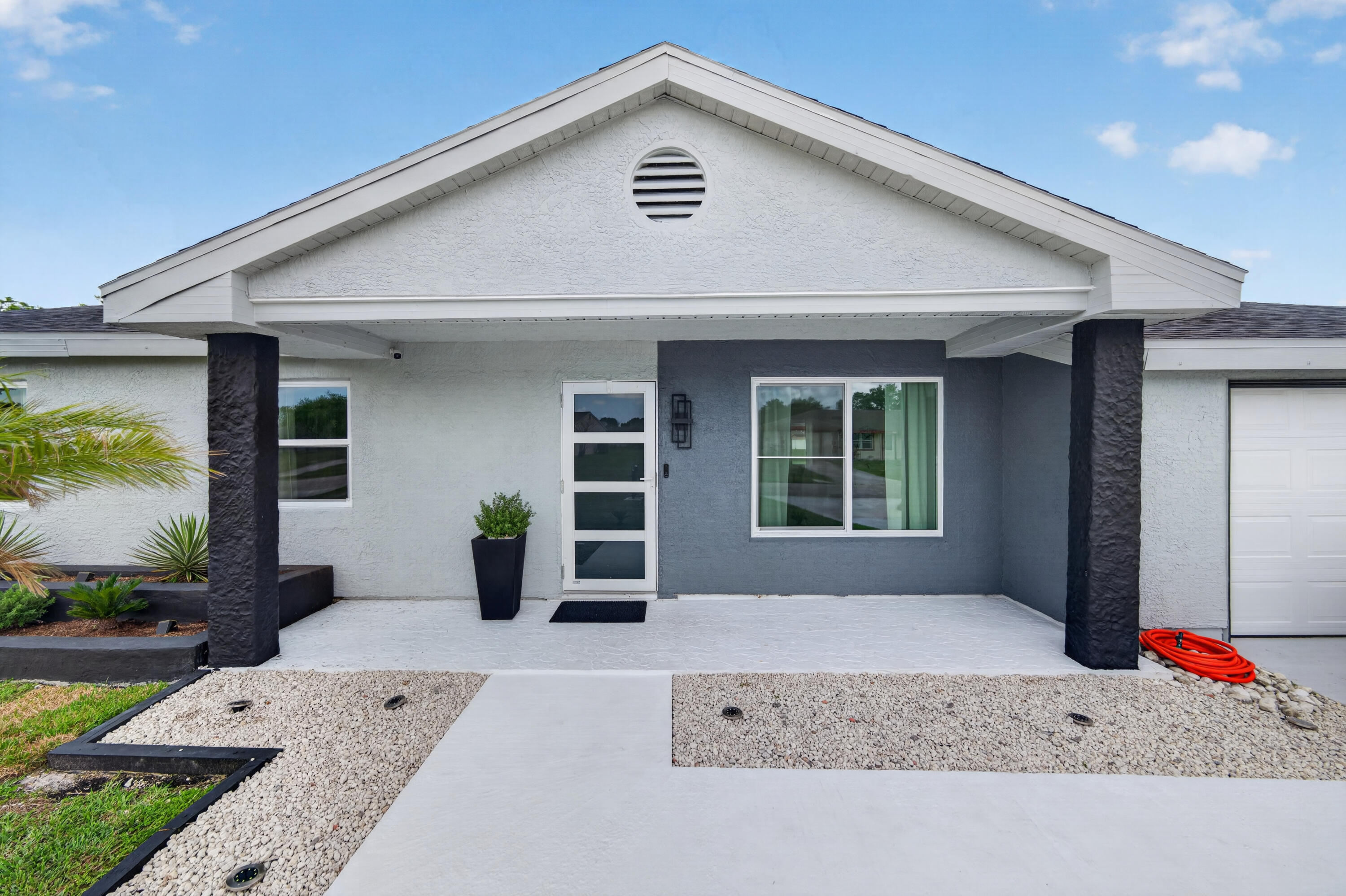 Welcome to this beautifully updated canal-front home in the heart of Port St. Lucie! This charming 3-bedroom, 2-bath residence offers approximately 1,320 square feet of comfortable living space with modern upgrades throughout. Features include updated flooring, a renovated kitchen with newer appliances, bright open living areas, and a functional layout designed for everyday comfort and entertaining. Enjoy peaceful water views from the spacious backyard with plenty of room to relax or host gatherings. Additional highlights include a 1-car garage, updated major systems, and a desirable location close to shopping, dining, schools, parks, golf courses, and major highways. Move-in ready and perfect as a primary home, seasonal retreat, or investment opportunity.
