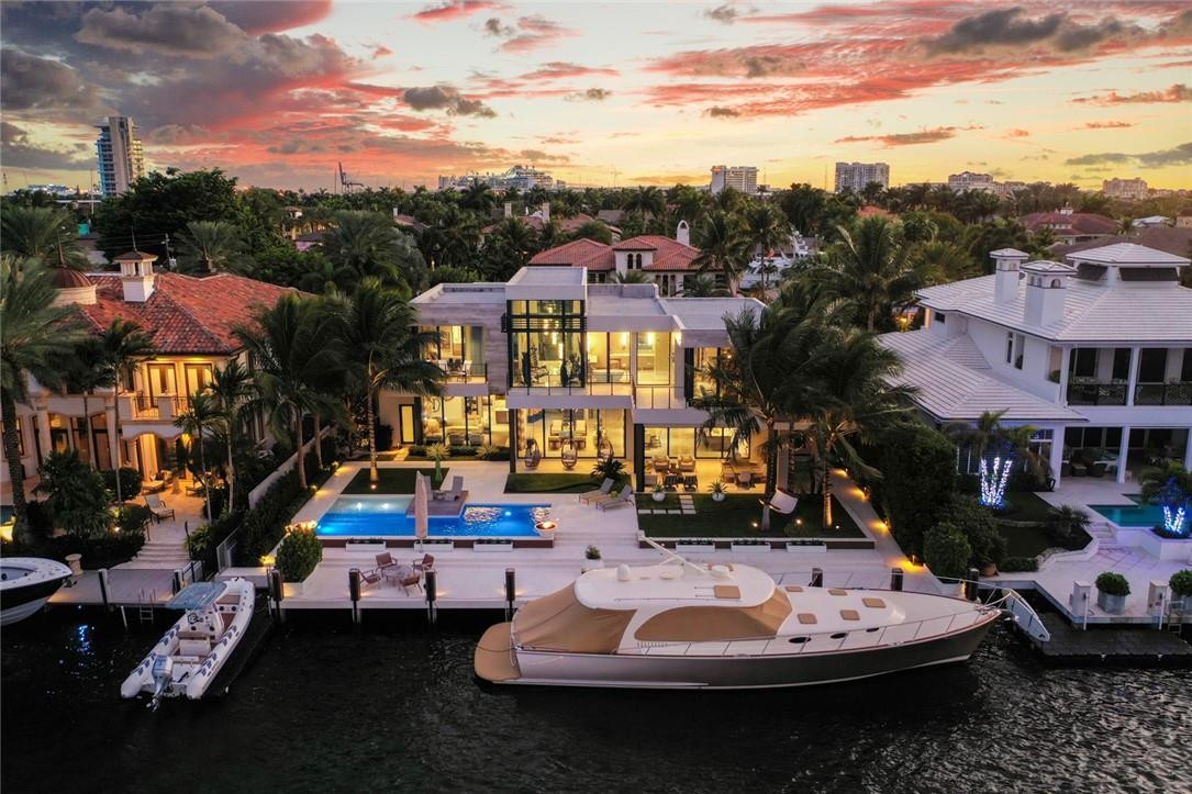 This is the one you’ve been waiting for in Prestigious Harbor Beach with Epic views over Davock Bay stretching a half mile to Bahia Mar!!  Better than new Construction, with Stunning Architecture by Randall Stofft, Precision building by W.A. Bentz and timeless FURNISHED interiors by DePerro Design.  This Modern home offers a spectacular main level with sleek open custom kitchen flowing perfectly to dining, great room, Media area all with sliding walls of glass leading to Epic outdoors. Gorgeous Master Suite with impressive views, custom showroom closet and sumptuous master bath. Extensive detailing and finishes throughout the home with all baths and suites uniquely curated. Incredible outdoors and heated Pool area, WF Gym, 3car garage 100ft WF, Elevator Generator, private surf club/ marina