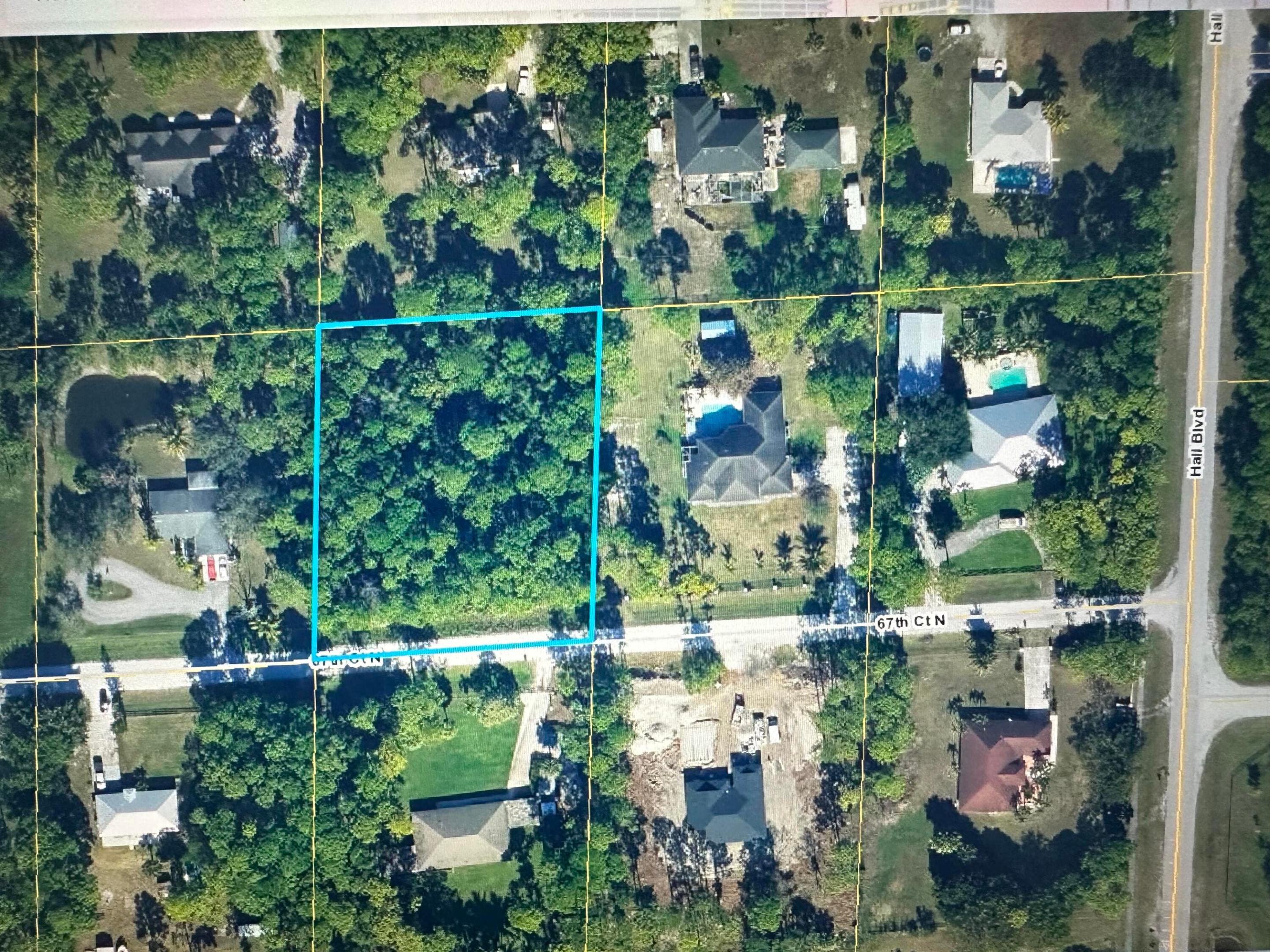 Build your dream home on this exceptional 1.14-acre high-and-dry lot in desirable Loxahatchee, Palm Beach County. This spacious parcel offers desirable north/south exposure, is loaded with mature pine trees, and is situated on a quiet, non-through street surrounded by beautiful homes. Located just two lots off paved Hall Boulevard, it provides the perfect balance of privacy and convenience. Enjoy the freedom of Agricultural Residential zoning with no HOA restrictions. Bring your horses, RVs, boats, trailers, and other recreational vehicles, and take advantage of the ample space to build a custom home, guest house, pool, workshop, barn, or additional structures to fit your lifestyle.  Conveniently located near Seminole Pratt Whitney Road, the City of... (see supplement for full remarks) Build your dream home on this exceptional 1.14-acre high-and-dry lot in desirable Loxahatchee, Palm Beach County. This spacious parcel offers desirable north/south exposure, is loaded with mature pine trees, and is situated on a quiet, non-through street surrounded by beautiful homes. Located just two lots off paved Hall Boulevard, it provides the perfect balance of privacy and convenience.  Enjoy the freedom of Agricultural Residential zoning with no HOA restrictions. Bring your horses, RVs, boats, trailers, and other recreational vehicles, and take advantage of the ample space to build a custom home, guest house, pool, workshop, barn, or additional structures to fit your lifestyle.  Conveniently located near Seminole Pratt Whitney Road, the City of Westlake, and the new Avenir master-planned community, you'll enjoy easy access to shopping centers, restaurants, banks, gas stations, parks, recreational activities, Westlake ER, and top-rated schools while still experiencing the peace and tranquility that make Loxahatchee so desirable. The property is currently zoned for excellent Westlake schools and is less than 30 minutes from downtown West Palm Beach.  Surrounded by quality homes and robust new development, including nearby high-end construction, this property is located in one of Palm Beach County's fastest-growing areas. With flexible zoning, no HOA, and strong future growth potential, it offers exceptional value for homeowners, builders, and investors alike.  Whether you're ready to build now or hold for the future, this rare build-ready acreage property provides the ideal combination of country living, modern convenience, and long-term investment potential.  The seller can provide a survey. All information provided is believed to be reliable; however, it is not guaranteed & is subject to errors, omissions, & changes without notice. Buyers should independently verify all information. All measurements are approximate estimates