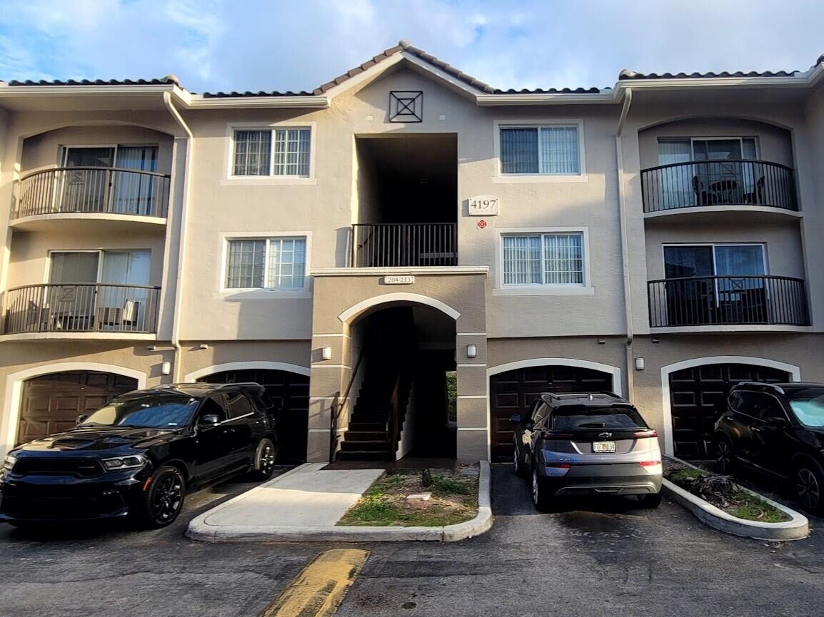 Discover this prime investment opportunity in Grand Isles—a condo with a reliable tenant already in place, plus two additional condos available for your portfolio!' This beautifully designed 3-bedroom, 2-bathroom unit features vaulted ceilings, a covered terrace with city views, and in-unit laundry. Community amenities include gated security access, a pool, a fitness center, tennis and volleyball courts, and a BBQ area. The prime location is minutes from Publix, Home Depot, and major highways, with easy access to shopping and entertainment. Two additional condos of various sizes are available to suit your investment needs!  The apartment can be leased from day one of ownership.  Please see 1/1 @ 4151 # 1505 & 2/2 4187 # 515 Min. days to lease 365.