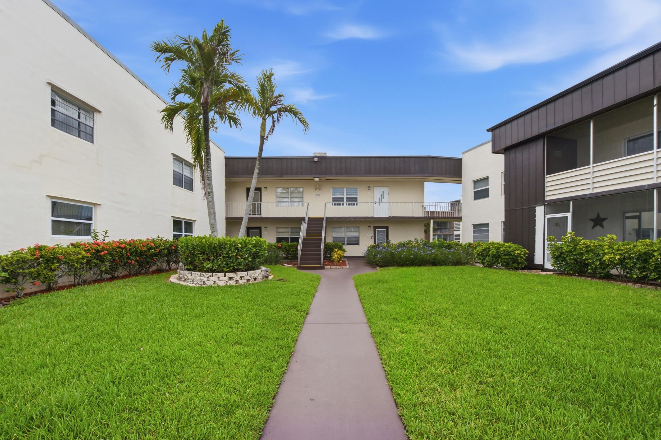Welcome to this beautiful ground-floor unit in the sought-after Kings Point 55+ community in Delray Beach. This 2-bedroom, 2-bath residence features tile and laminate flooring throughout, quartz countertops, and the convenience of an in-unit washer and dryer. Enjoy resort-style living with access to clubhouses, indoor and outdoor pools, fitness centers, tennis and pickleball courts, a theater, social clubs, courtesy bus service, and endless activities. Conveniently located near shopping, dining, golf courses, and just minutes from Downtown Delray Beach and the beach. Don't miss this opportunity to enjoy the active South Florida lifestyle!