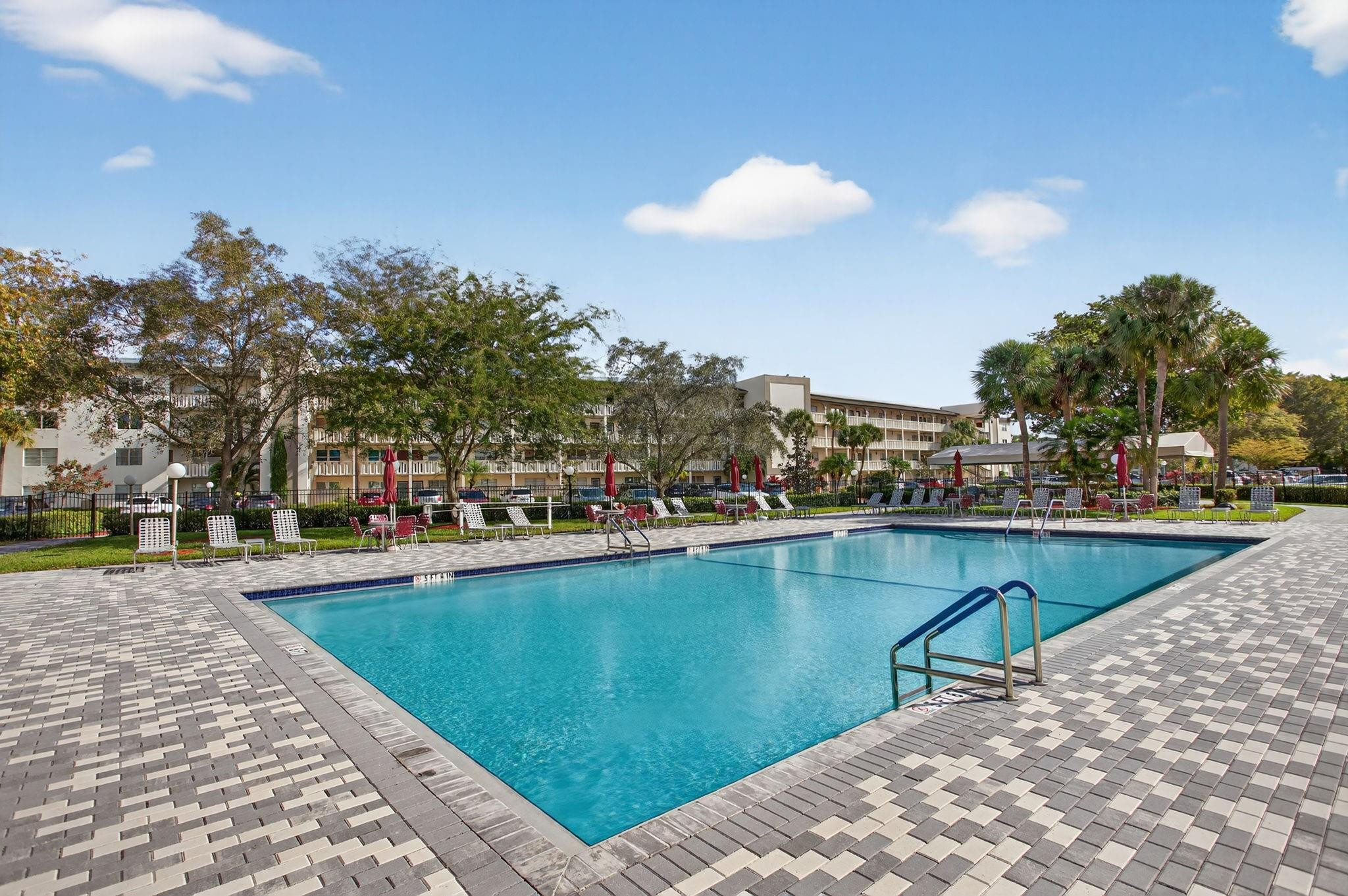 TLC-SALE OF THE CENTURY-POOL IN FRONT OF YOUR BLDG. 1 BEDRM-1+1/2 BATHRMS WITH INSIDE WASHER & DRYER. GREAT WAY TO ENJOY AFFORDABLE LIVING IN WYNMOOR.  VERY LARGE MASTER BEDROOM WIH WALL FULL OF CLOSETS. ENJOY YOUR BALCONY WITH IT'S SERENE & INVITING VIEW.  YOU CAN RELAX AT THE END OF THE DAY SIPPING A GLASS OF WINE OR WAKE UP TO THE SUN CALLING YOUR NAME AS YOU ENJOY A MORNING CUP OF COFFEE. WYNMOOR IS A GATED GOLF COMMUNITY WITH NO EXORBITANT GOLF FEES.  RESIDENTS ENJOY A WEALTH OF AMENITEIS LIKE COURTESY TRANSPORTATION, AN EXECUTIVE GOLF COURSE, FREE CABLE TV, $2 FIRST RUN MOVIES, REST. ON SITE, PICKLEBALL, TENNIS, THEATER, DANCES, BAR-B-Q WITH A DJ FOR YOUR DANCING PLEASURE, BILLARDS, EXERCISE FACILITY, ARTS & CRAFTS & MORE.   6 MILES TO NEW POMPANO BEACH-NEW REST., SHOPS & PARKING. TLC-SALE OF THE CENTURY- POOL IN FRONT OF YOUR BLDG.1 BEDRM-1+1/2 BATHRMS WITH INSIDE WASHER & DRYER. GREAT WAY TO ENJOY AFFORDABLE LIVING IN WYNMOOR.  VERY LARGE MASTER BEDROOM WIH A WALL FULL OF CLOSETS. ENJOY YOUR BALCONY WITH IT'S SERENE & INVITING VIEW.  YOU CAN RELAX AT THE END OF THE DAY SIPPING A GLASS OF WINE OR WAKE UP TO THE SUN CALLING YOUR NAME AS YOU ENJOY A MORNING CUP OF COFFEE. REMODLE WITH YOUR CHOICES. WYNMOOR IS A GATED GOLF COMMUNITY WITH NO EXORBITANT GOLF FEES.  RESIDENTS ENJOY A WEALTH OF AMENITEIS LIKE COURTESY TRANSPORTATION, AN EXECUTIVE GOLF COURSE, FREE CABLE TV, $2 FIRST RUN MOVIES, REST. ON SITE, PICKLEBALL, TENNIS, THEATER, DANCES, BAR-B-Q WITH A DJ FOR YOUR DANCING PLEASURE, BILLARDS, EXERCISE FACILITY, ARTS & CRAFTS & MORE.   6 MILES TO NEW POMPANO BEACH-NEW REST., SHOPS & PARKING.