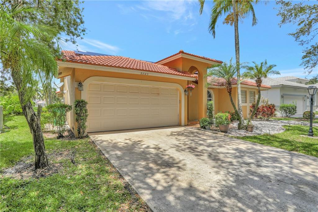 This well-maintained 4 bed 2.5 bath bath home in The Arbors at Coral Creek. Don't miss this beautiful 2 car garage home with lots of potential. Great for first time home owners or investors. Great open floor concept featuring split bedroom floorplan, formal & casual dining areas w/ lots of natural lighting. Perfect for creating lots of wonderful memories. Walk outback onto a huge screened patio surrounded by a lush tropical back yard w/space and water views great for entertaining or relaxing after a hard day. Plenty of privacy. This home is ready to make it your own!