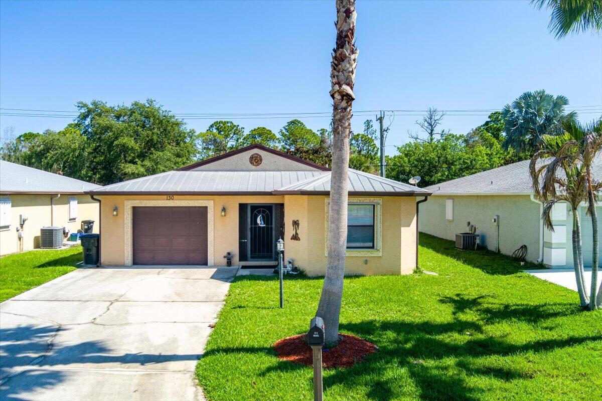 RARE Find! 3 Bedrooms/2 Baths! Spacious living area for you and your guests. Private backyard, located on a canal. This 2013 built CBS construction home with a metal roof and accordion hurricane shutters built for safety and comfort. Granite counters & stainless steel appliances. Enjoy relaxing and privacy as this glass enclosed porch overlooks the canal. Clean & Move in Ready! Located in the active & desirable Spanish Lakes 55+ Community. All amenities and free lawn care are included with your monthly land lease. 2 Swimming pools, Fitness Center, Pickleball, Tennis, Billiards, Game Room and more.
