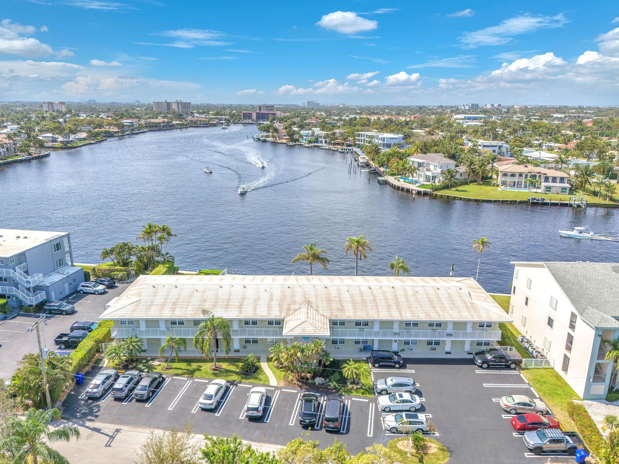 Experience breathtaking, unobstructed views of the Intracoastal from this beautiful one-bedroom apartment located in a spectacular area just north of the charming city of Lauderdale by the Sea. Once you arrive, you'll find it hard to leave – indulge in the pure bliss of lounging by the heated pool, basking in the sensational South Florida sun, and enjoying your own personal front-row seat to the boats passing by and phenomenal sunsets over the water. Perfect location- short walk to the beach and close to the restaurants, shopping and anything else you may need. This place is move in ready, could be sold furnished, just bring your toothbrush. RARELY AVAILABLE- DONT MISS!!! MOTIVATED SELLER!