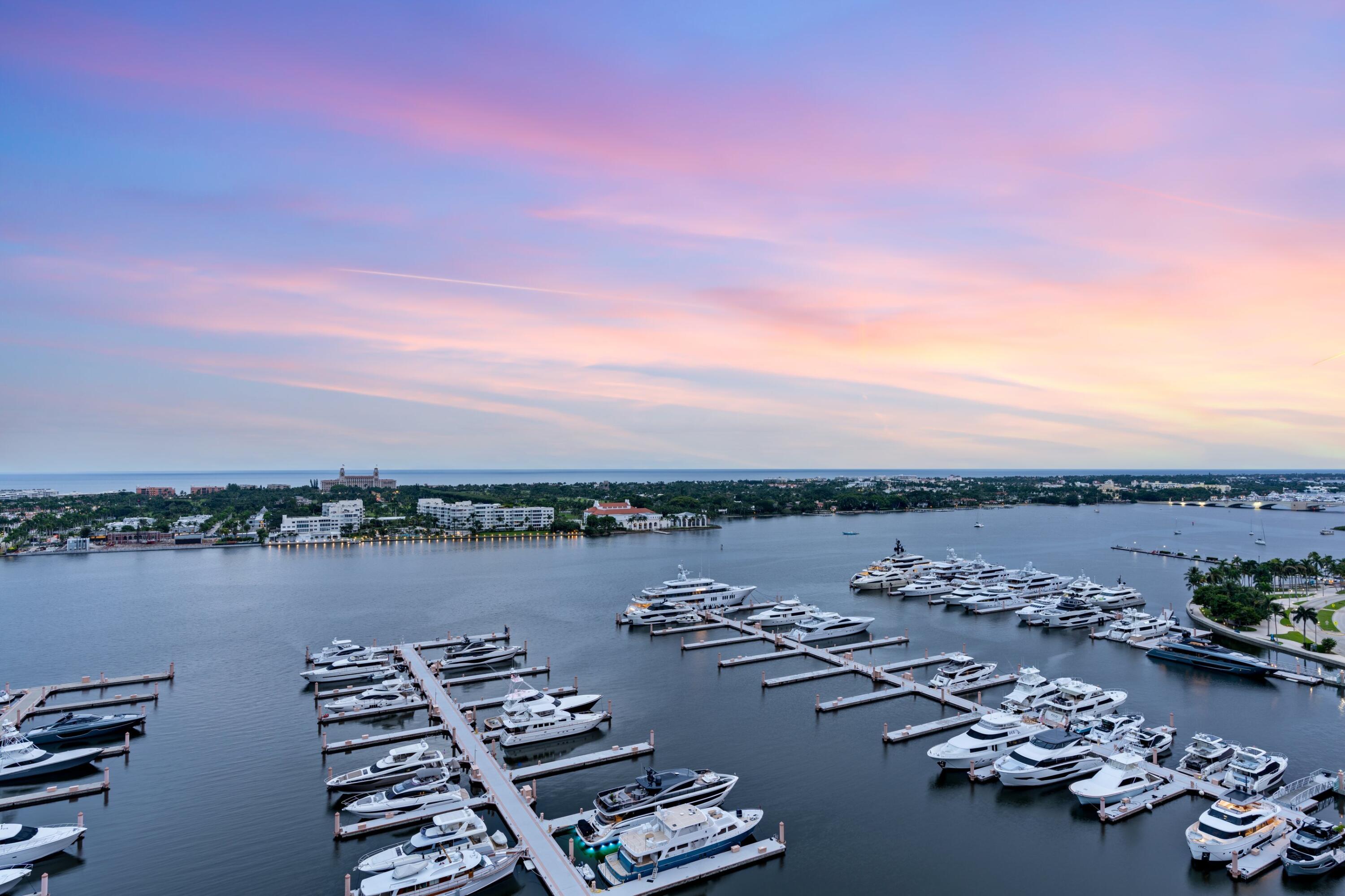 Stunning PENTHOUSE! - Direct East Intracoastal & Ocean Views! Exquisite Recent Renovation - Elegant Italian stone flooring throughout. Impressive kitchen features Thermador refrigerator & oversized wine fridge, Bosch double-ovens & induction cooktop, 2 Fisher & Paykel dishwashers, & refrigerator drawers. The kitchen, living, and dining area maximize water views and open up to a generously sized terrace -- perfect for alfresco dining. Rare flowthrough views from East to West. Three (3) terraces in total. Electric shades & impact doors/windows throughout. Experience breathtaking sunrises and sunsets from every room. Prime location next to Palm Harbor Marina, directly across from The Royal Plaza (Hermés, Sant Ambroeus, PB Grill, etc) on Palm Beach Island. Waterview Towers is... ...a full-service building with valet, 24-7 doorman, tennis, pickle ball, swimming pool, fitness, & security.