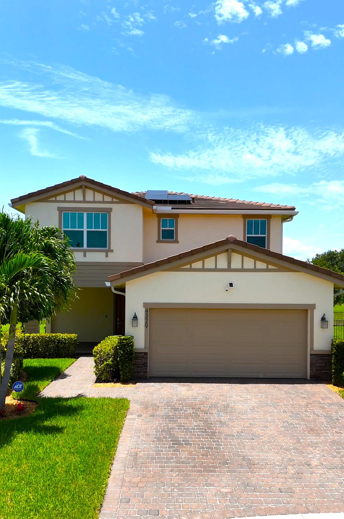 Welcome to this beautifully maintained two-story waterfront home in the desirable gated community of Veleiros at Crystal Lake in Deerfield Beach. This stunning residence offers 2,740 square feet of living area, featuring unobstructed lake views, a desirable cul-de-sac lot, and exceptional privacy with a peaceful waterfront setting.  Built in 2021, this newer construction home features a modern open-concept design with four bedrooms and three bathrooms, complemented by thoughtful upgrades throughout, including brand-new porcelain tile flooring, updated primary bathroom flooring, a new kitchen sink, and security cameras for added peace of mind.  Enjoy the perfect blend of comfort and waterfront living with spacious interiors, beautiful views, and a serene outdoor setting. The community offer Enjoy the benefits of solar energy with an existing solar system and security cameras that will remain with the home. The solar system may provide energy efficiency benefits and potential savings on electricity costs. The existing GoodLeap solar financing agreement may be transferred to the new owner, subject to buyer qualification and approval. The listing agent will assist with the transfer process to help ensure a smooth transition.  Motion detectors and sensors on windows and doors on the 1st floor and  a  more powerful garbage disposal recently installed.