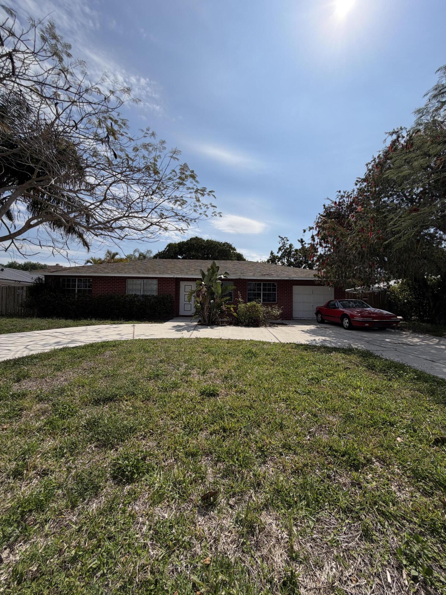 Say Hello to this Hidden gem Located in Royal Palm Beach, Ready for a special buyer or Investor to put their special touch on it, Fenced backyard and Brand New AC. No Hoa Great Location