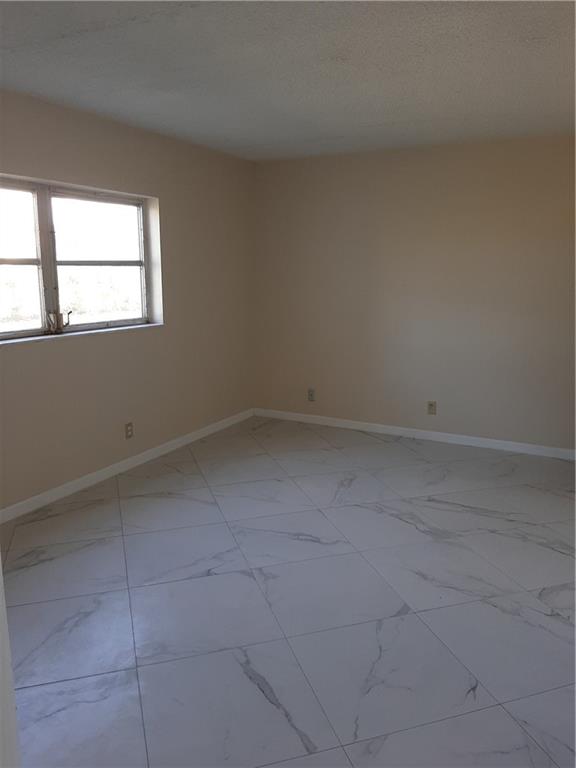 Clean vacant 2 bedroom 2 bath apartment with new appliances and new tile floor. There is also a dedicated parking space and storage locker included. Association property features a number of amenities including 2 beautiful pools and fitness center. Water and cable are included in the quarterly association fee. *** This is a 55+ condominium association.