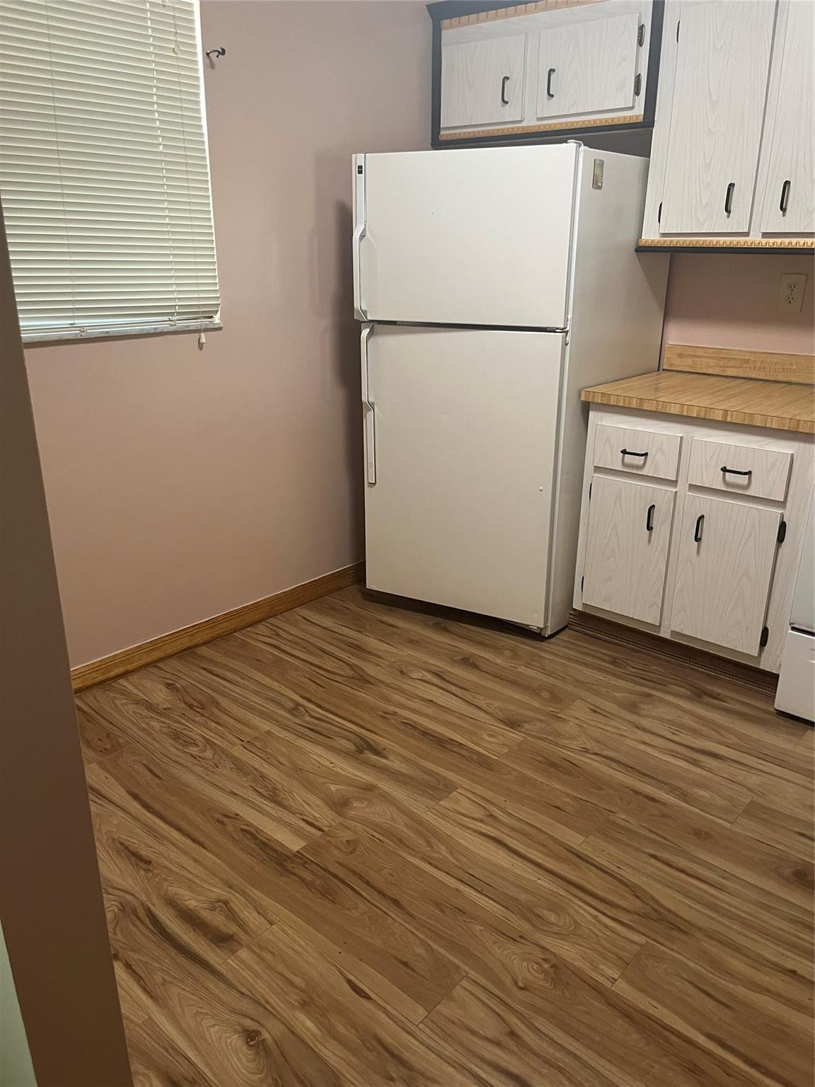 Investors dream totally remodeled wood floors no age or pet restrictions.  Can be rented immediately. Gated clubhouse, pool