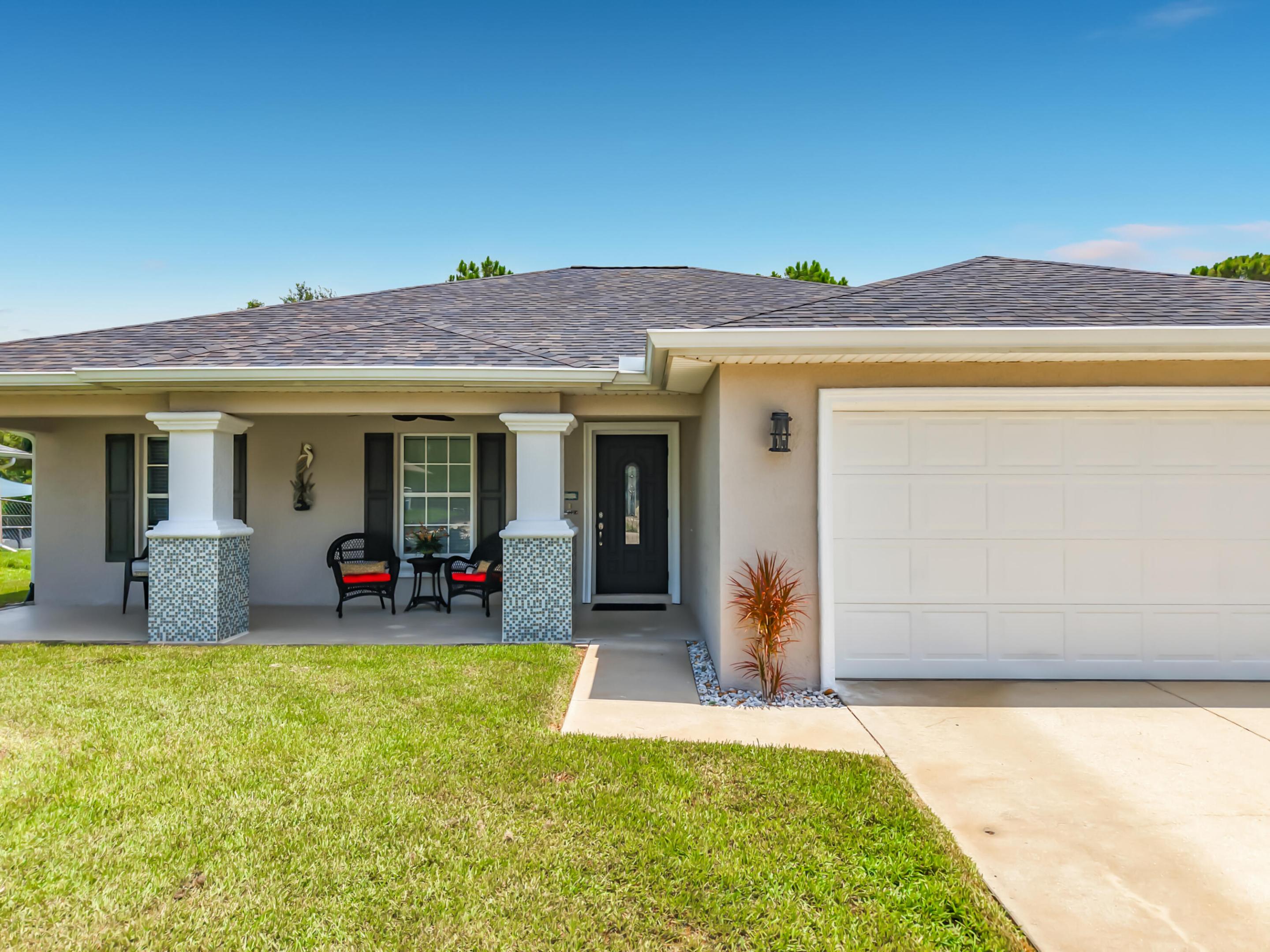 Meticulously maintained and move-in ready, this 3-bedroom plus den home offers extensive updates and peace of mind. Major improvements include a NEW roof (2025), Rheem 3-ton A/C system (2024), impact glass windows and doors, wrap-around gutters (2020), and fresh exterior paint (2026). The kitchen features Whirlpool appliances (2019). The den/home office includes custom built-in wood cabinetry and desk space. Outside, enjoy a fully fenced backyard with a 8x10 storage shed (2021). New water softener (2025) and reverse osmosis under the kitchen sink. Average FPL bills of approximately $125/month. Conveniently located near shopping, dining, schools, and commuter routes, this well-cared-for home is ready for its next owner.