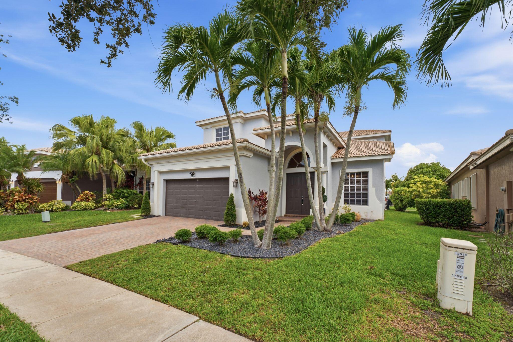 Showstopper in Heron Cove at Heron Bay! This stunning 4-bedroom, 3-bath home showcases beautifully designed interiors, a chef-inspired kitchen with premium appliances, including a Sub-Zero refrigerator, and an ideal floor plan with one bedroom and a full bath on the first floor. Enjoy breathtaking lake views from the brand-new glass tile pool, plus an oversized backyard with plenty of green space for entertaining and play. Located in one of Parkland's most desirable gated communities with resort-style amenities and top-rated schools.