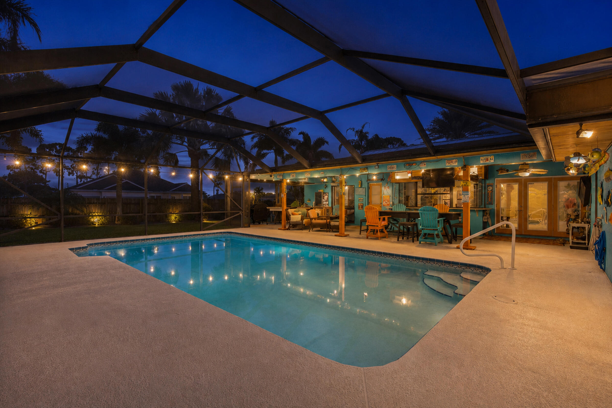 Create memories in this beautiful corner lot pool home in the heart of Port St. Lucie! This residence features a renovated kitchen with newer appliances, abundant cabinets and storage drawers. For your peace of mind this property has a newer Metal Roof (2025), a New AC (2026), newer Water heater (2025), and Plumbing (2021). Elegant Italian porcelain tile flooring flows throughout the entire home, creating a modern look. Other features include updated bathrooms, newer ceiling fans, a generous primary walk-in closet, screens for the garage and front door, beautiful landscaping, and fenced backyard . Step outside and enjoy a fully screened outdoor entertainment area featuring a pool and an extended patio. Perfect for hosting guests, or relaxing and enjoying Florida's year round sunshine. Conveniently located near shopping, dining, schools, and major highways, this well-maintained home offers the ideal combination of comfort, style, and outdoor living.