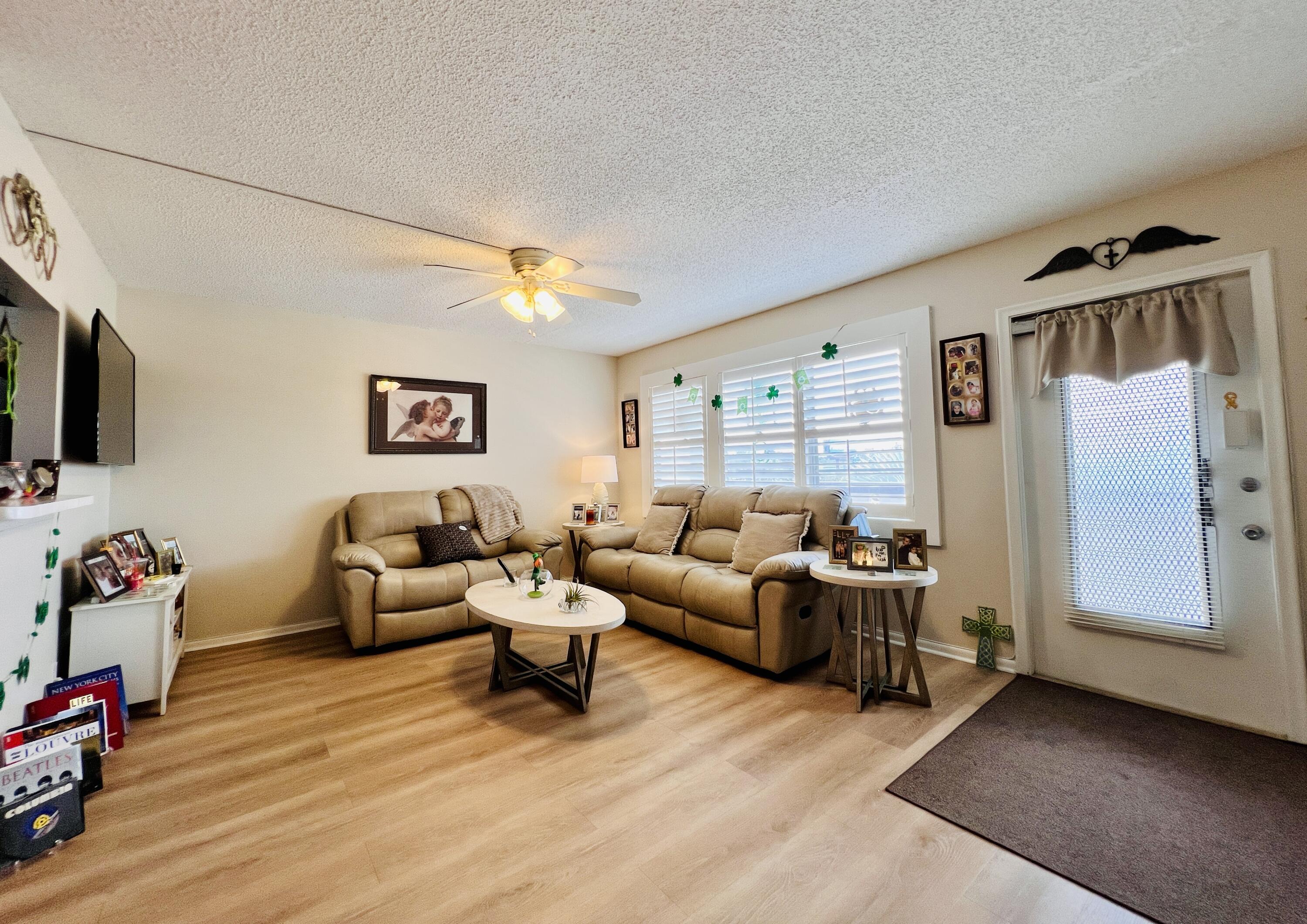 **YOU MUST SEE** this beautifully & meticulously completely redone move-in ready 3rd floor condo. Enjoy your coffee or wine on your spacious lanai with a stunning lake view. New luxury vinyl flooring throughout The updated open kitchen boasts modern cabinets, sleek countertops with eye-catching backsplash. Large living room w/ upgraded flooring & window treatments.  bedroom features a ensuite bathroom and a full wall of closet space. Both bathrooms are all redone as well. The unit also features central a/c that was completely serviced. Luxury building features a New Roof (2023), No assessments, Reserves, Two Elevators, Extra Storage, Two Laundry Rooms/Floor, and Trash Chutes. Century Village is a vibrant 55+ community centrally located in desirable Palm Beach County, FL.... Century Village is a 55+ Resort Style community with so much to offer - Much To Offer - shows, movies, clubs, pools, security, and transportation service. The Clubhouse features a theater, indoor pool, card room, community/party room, billiard room, shuffleboard, tennis, pickleball, bocce, and two outdoor pools, Numerous heated outdoor pools throughout the community. Separate fitness center with gym and outdoor heated pool & resistance pool. Two guarded gates and 24-hour roving security patrol.