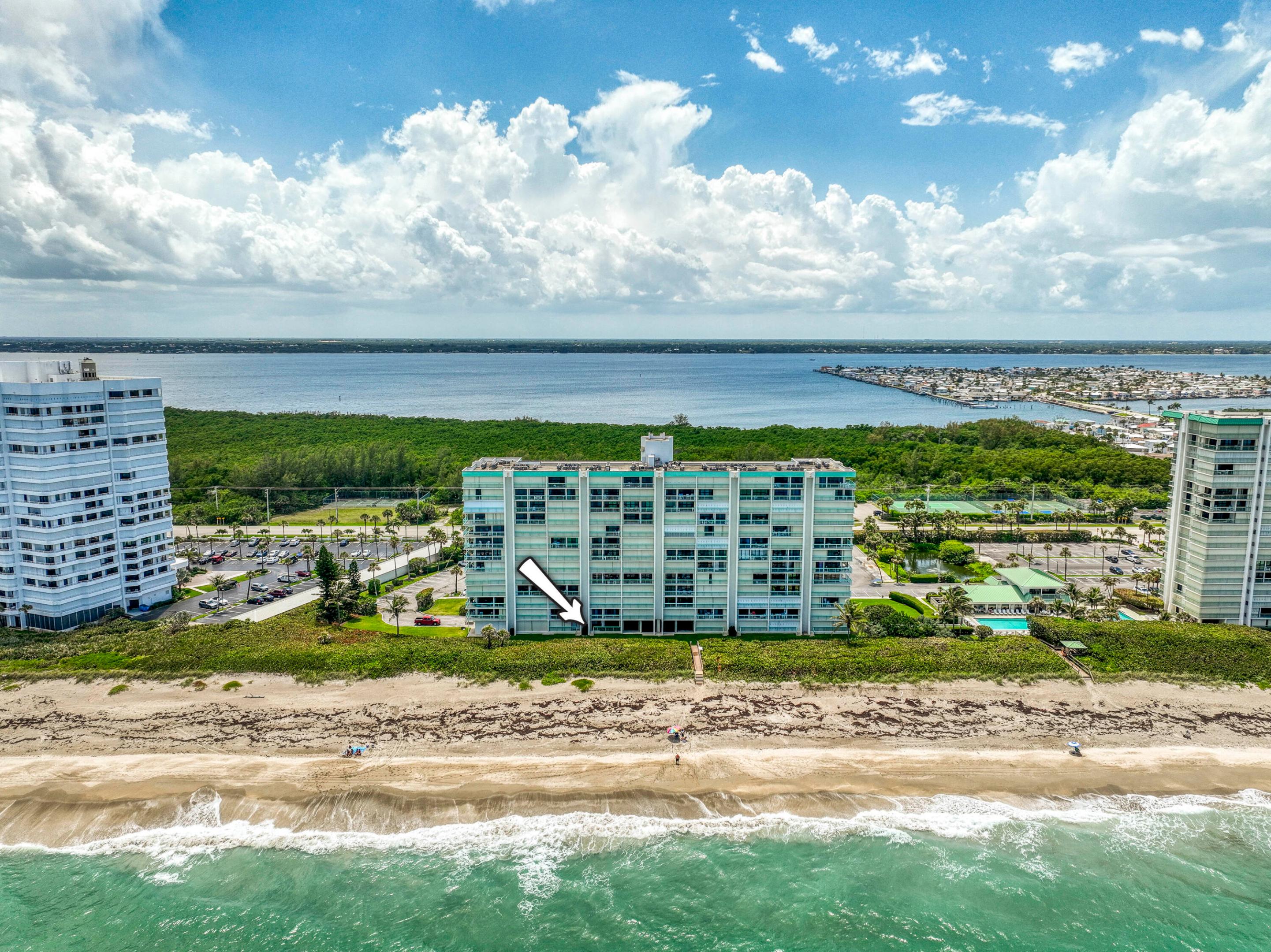 Experience coastal living in this beautifully updated ground-floor 1-bedroom, 2-bath condo located in the highly desirable Oceana North community. Meticulously renovated and move-in ready, this stunning residence features an open-concept floor plan with elegant tile flooring throughout, brand-new quartz countertops, a stylish tile backsplash, stainless steel appliances, designer tile showers, modern bathroom vanities, and a new impact-resistant glass sliding door. Step outside to your private patio and enjoy the convenience of direct beach access just steps from your door. Whether you're seeking a full-time residence, seasonal retreat, or investment opportunity, this condo offers the perfect blend of comfort, style, and location. Residents of Oceana North enjoy an impressive selection of  resort-style amenities, including two private swimming pools, a clubhouse with social spaces, private beach access, a fitness center, pickleball courts, and convenient RV and boat storage. Don't miss this rare opportunity to own a turnkey beachside property and enjoy the very best of Florida's coastal lifestyle. Schedule your private showing today!