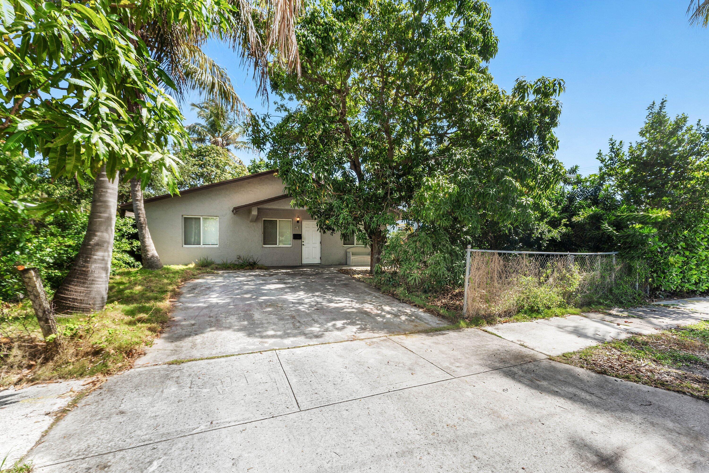 A perfect home, located in a convenient location in close proximity to shopping, museum, performing arts and restaurants.   The zoning for this property is for the Palm Beach Elementary School.  Special features of this home include a new piping system throughout, and new air conditioning.  The kitchen has been renovated and features updated appliances, new cabinetry and counters.  There is also an outside structure for storage located in the back of the home.  The home is a great investment with no hidden costs.