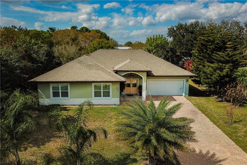 Welcome to this stunning 2024 custom-built home in Sebastian. Featuring 4 bedrooms, 3 full bathrooms, and a 2-car garage, this home truly stands out from typical new construction. Enjoy soaring cathedral ceilings, an open-concept layout ideal for entertaining, and custom-built closet organizers throughout. Every detail was thoughtfully designed, making this a one-of-a-kind property. Conveniently located near beautiful beaches, I-95, and shopping plazas, this home offers both comfort and accessibility. A must-see for buyers seeking quality, style, and something truly special.